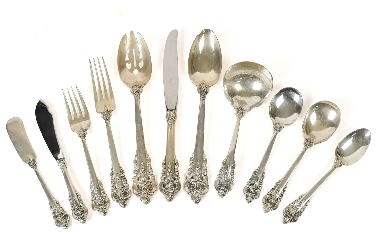 WALLACE GRANDE BAROQUE STERLING, SERVICE FOR 8.: A set of Wallace Grand Baroque sterling flatware, including; 8 dinner forks 7.5”L, 8 luncheon forks, 8 teaspoons 6.25”L, 8 soup spoons 6”L, 5 serving pieces 6.5”-9”L.