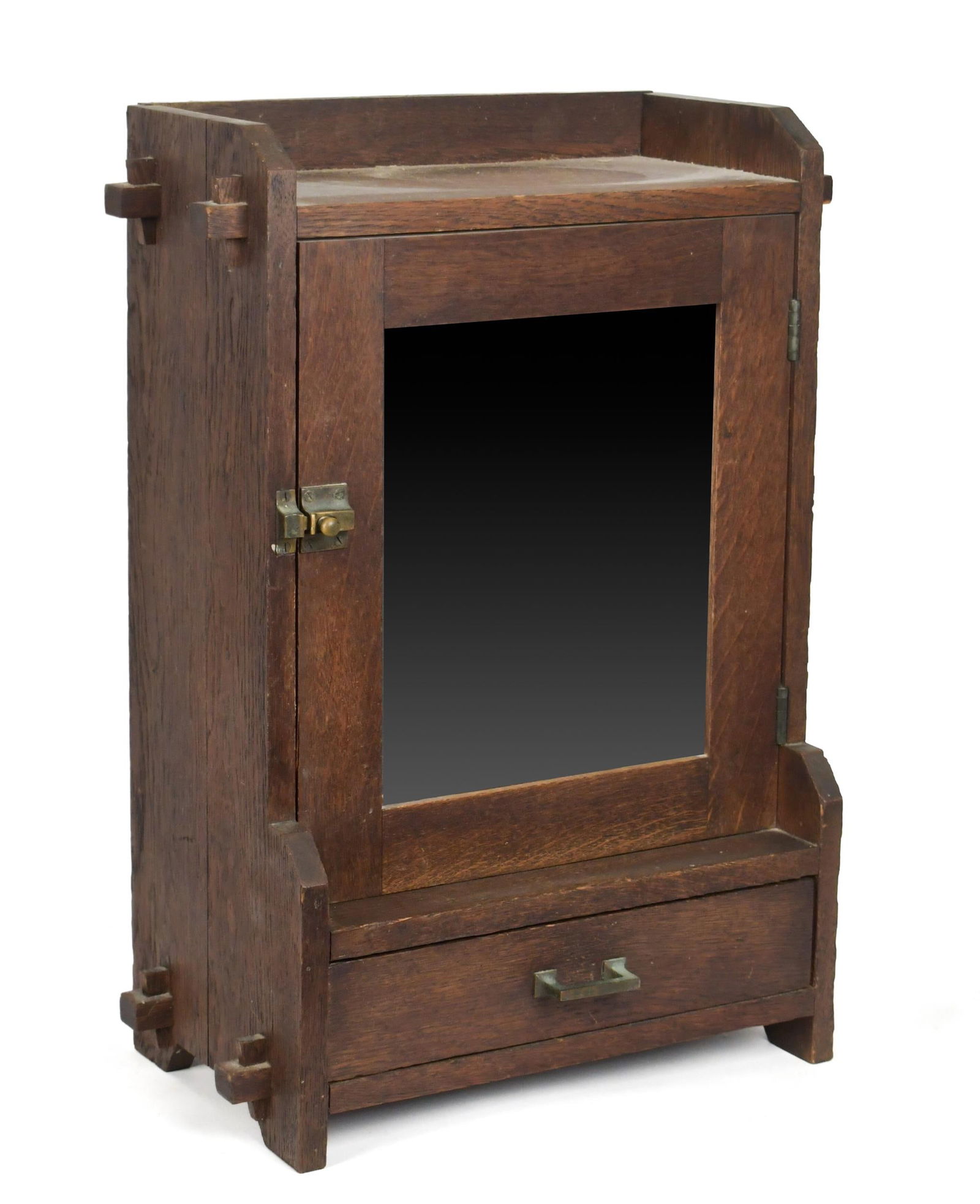 ANTIQUE ARTS & CRAFTS MEDICINE CABINET.: An antique wall hanging, single door Mission oak medicine cabinet with a mirrored door, no makers marks or labels.24.5”H x 15”W x 9.5”D.