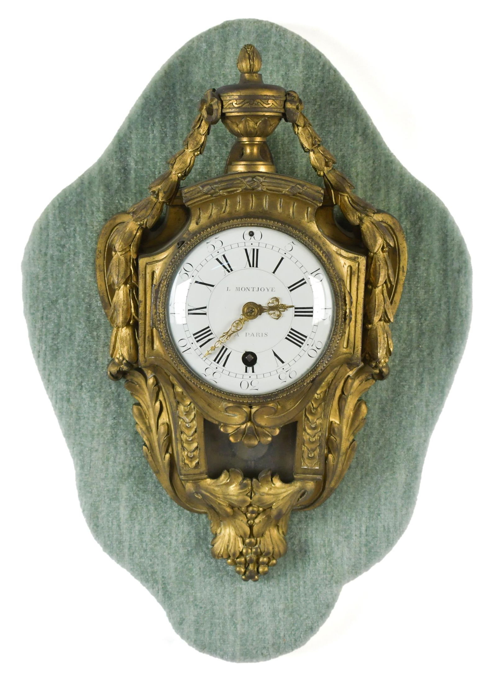 ANTIQUE FRENCH DORE GILT CARTEL WALL CLOCK, MONTJOYE.: A 19th C. gilt decorated bronze French cartel wall clock with a signed porcelain dial, L. Montjoye A. Paris. Clock 16”H x 9”W.