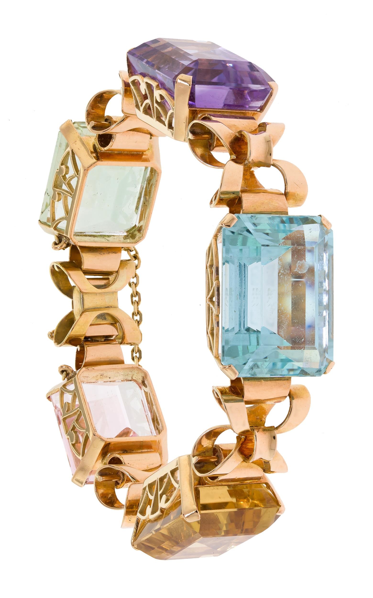 VINTAGE RETRO 18K GOLD MULTI-COLOR STONE BRACELET.: A vintage, 18k rose and yellow gold (stamped), Retro period bracelet, set with approx. 150 ct. tw., emerald cut, medium-light, green beryl, pink morganite, slightly greenish-blue aquamarine, purple am