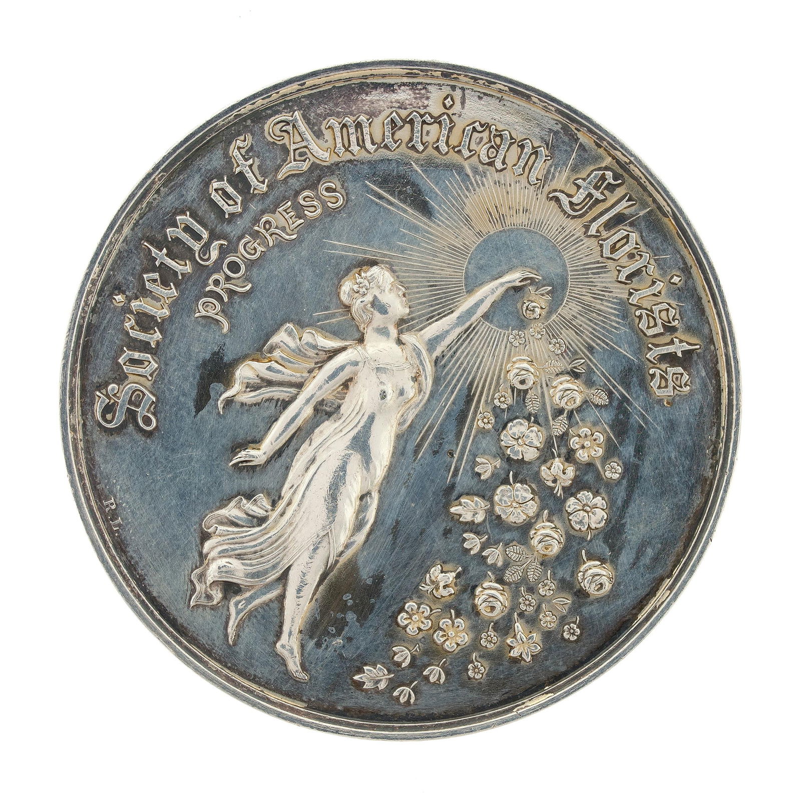 1909 SILVER SOCIETY OF AMERICAN FLORISTS MEDAL.: An antique, .925 (sterling) silver or higher (tested), Society of American Florists medal awarded to F. Dorner & Sons Company, 1909, 51mm, 2.03 oz t.