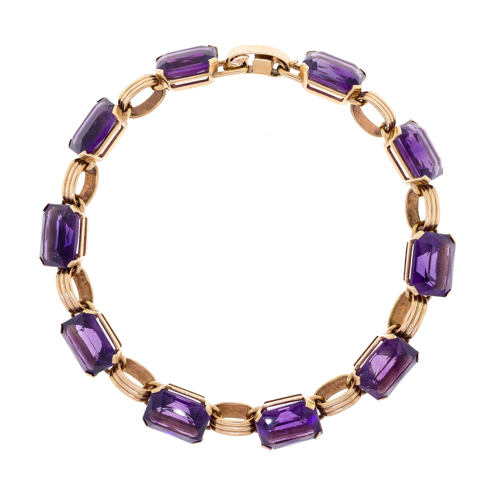 VINTAGE 14K GOLD EMERALD CUT AMETHYST BRACELET.: A vintage, 14k yellow gold (stamped) link bracelet set with approx. 25 ct. tw., emerald cut, medium purple amethyst, 8mm wide, 7 inches long, 17.8 grams.
