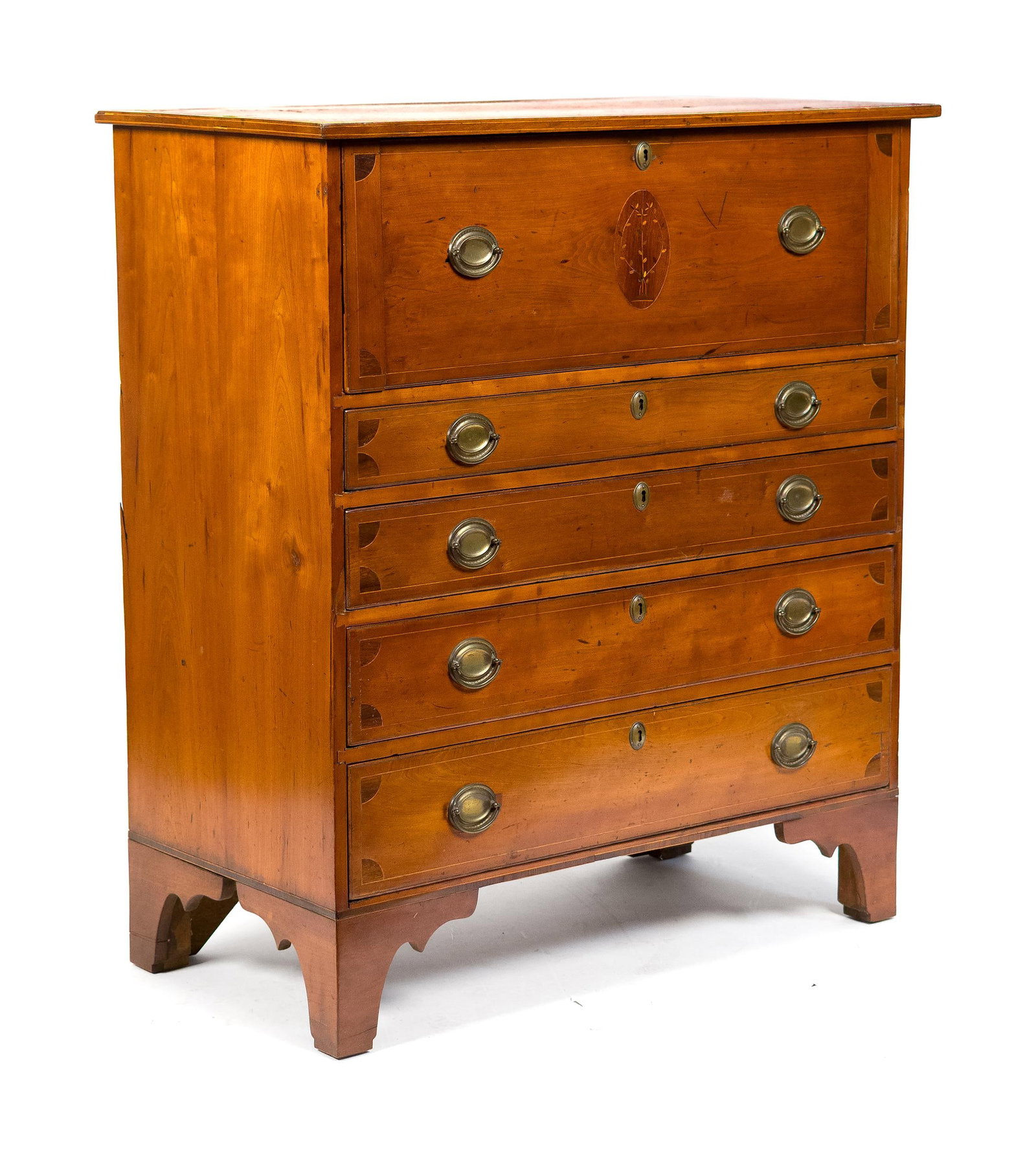FEDERAL CT RIVER VALLEY INLAID CHERRY BUTLERS CHEST.: A ca. 1800 Federal Connecticut River Valley inlaid cherry Butler’s chest with a hinged front desk drawer, a whimsical inlaid floral cartouche, and a fitted interior, over four full length