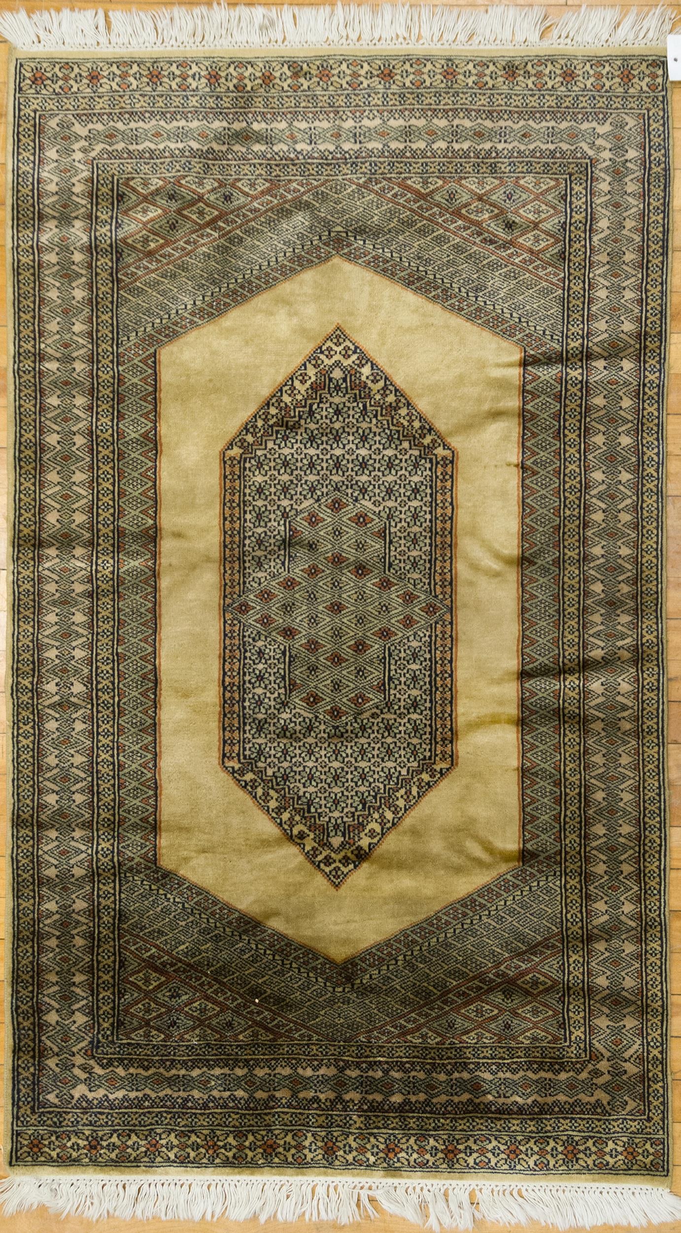 VINTAGE ORIENTAL SCATTER RUG.: A vintage mercerized cotton Oriental prayer rug, with central medallion, in tan ground, with complex borders. 3’ x 5’2”.