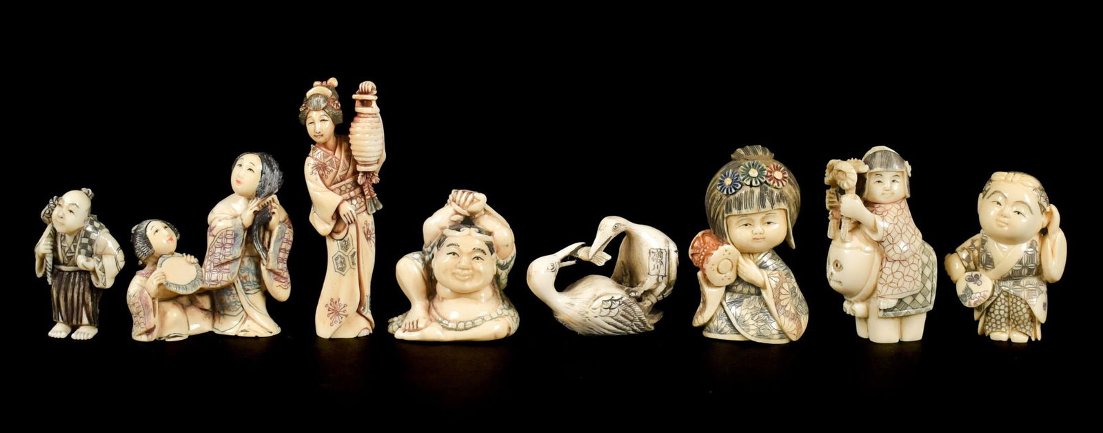 JAPANESE MEIJI NETSUKES, BIRDS, WOMEN, ETC. 8 PCS.: Eight Japanese Meiji Netsukes, including; two birds fighting over fish, women brushing hair, and more! 1.5” to 2.5” H.