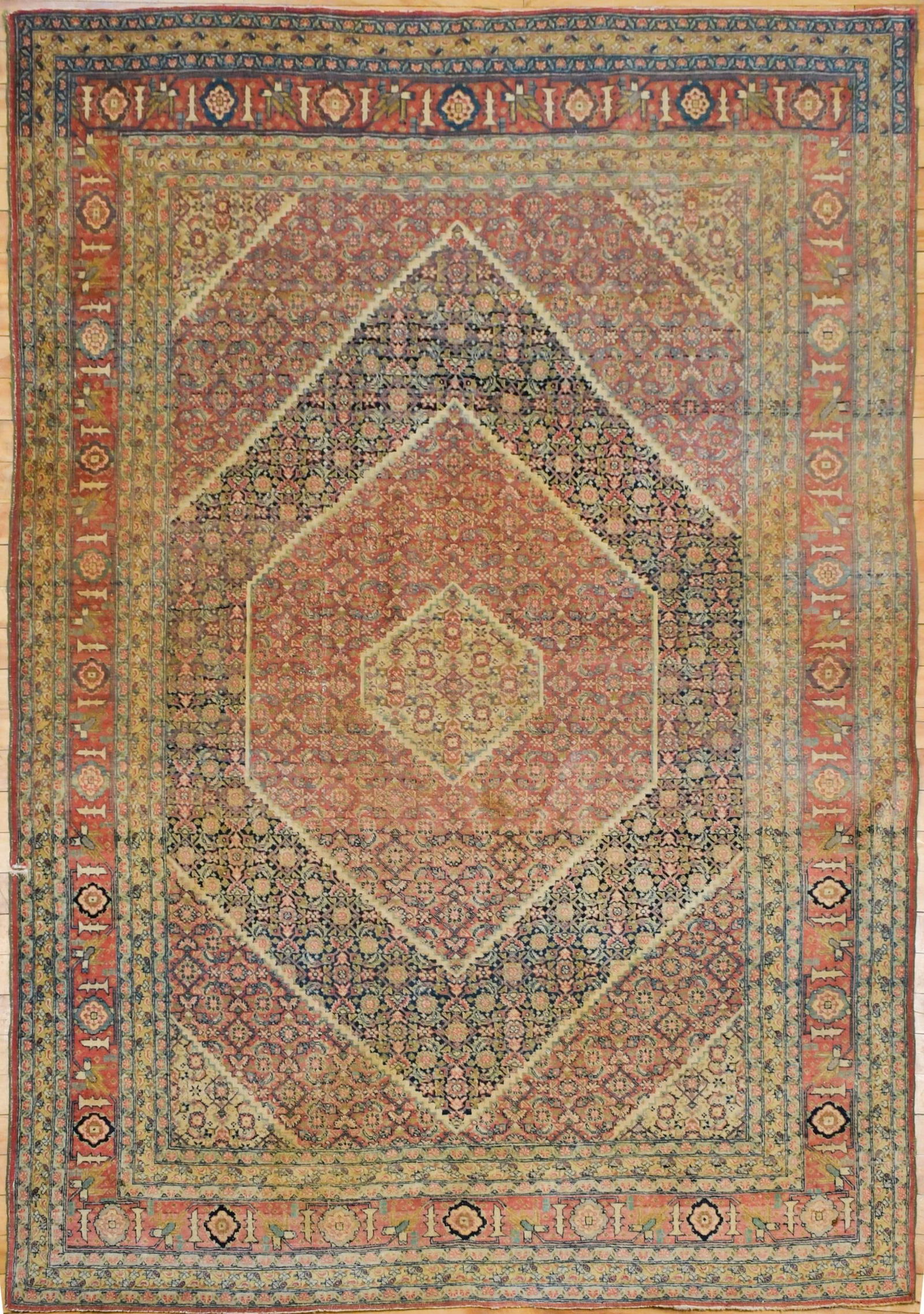 VINTAGE PERSIAN AREA RUG.: A vintage finely hand woven Oriental area rug, with intricate geometric design in pink, blue, ivory and pale green. 4’7” x 6’2”.