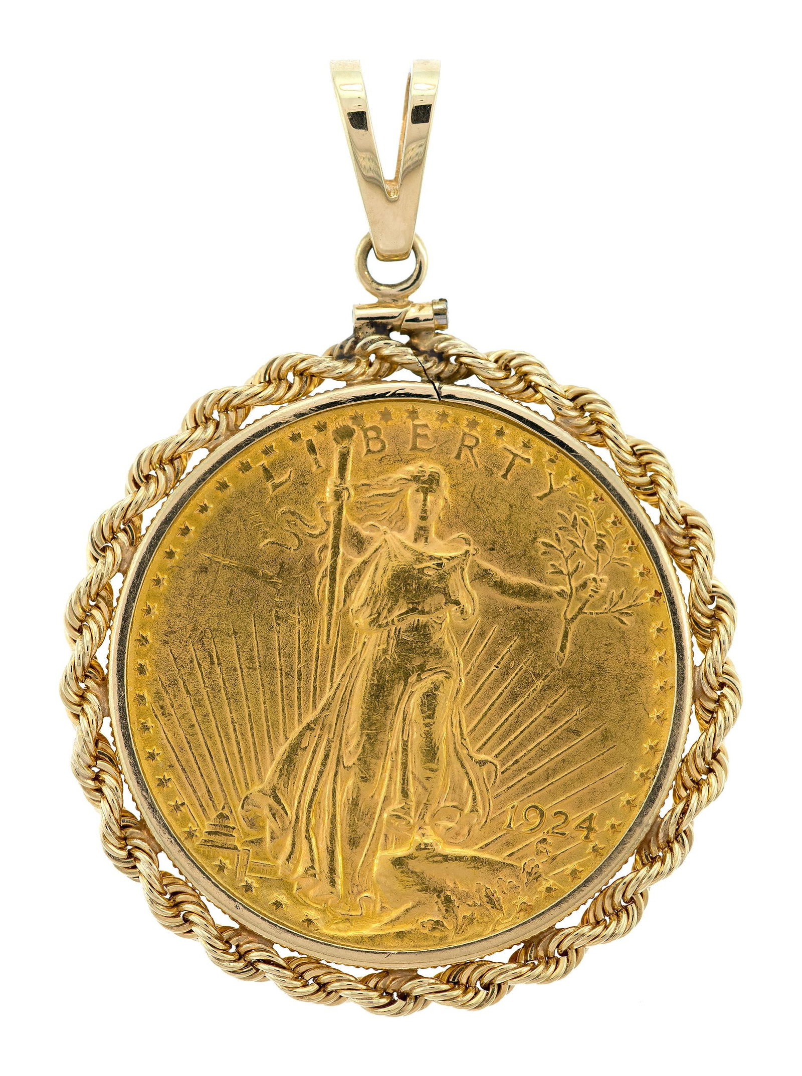 1924 ST. GAUDENS DOUBLE EAGLE $20 GOLD COIN.: A 1924, St. Gaudens 'Double Eagle' $20 gold coin, set into a 14k yellow gold (stamped) coin frame, 2 3/16 inches long, 40.3 grams total weight.
