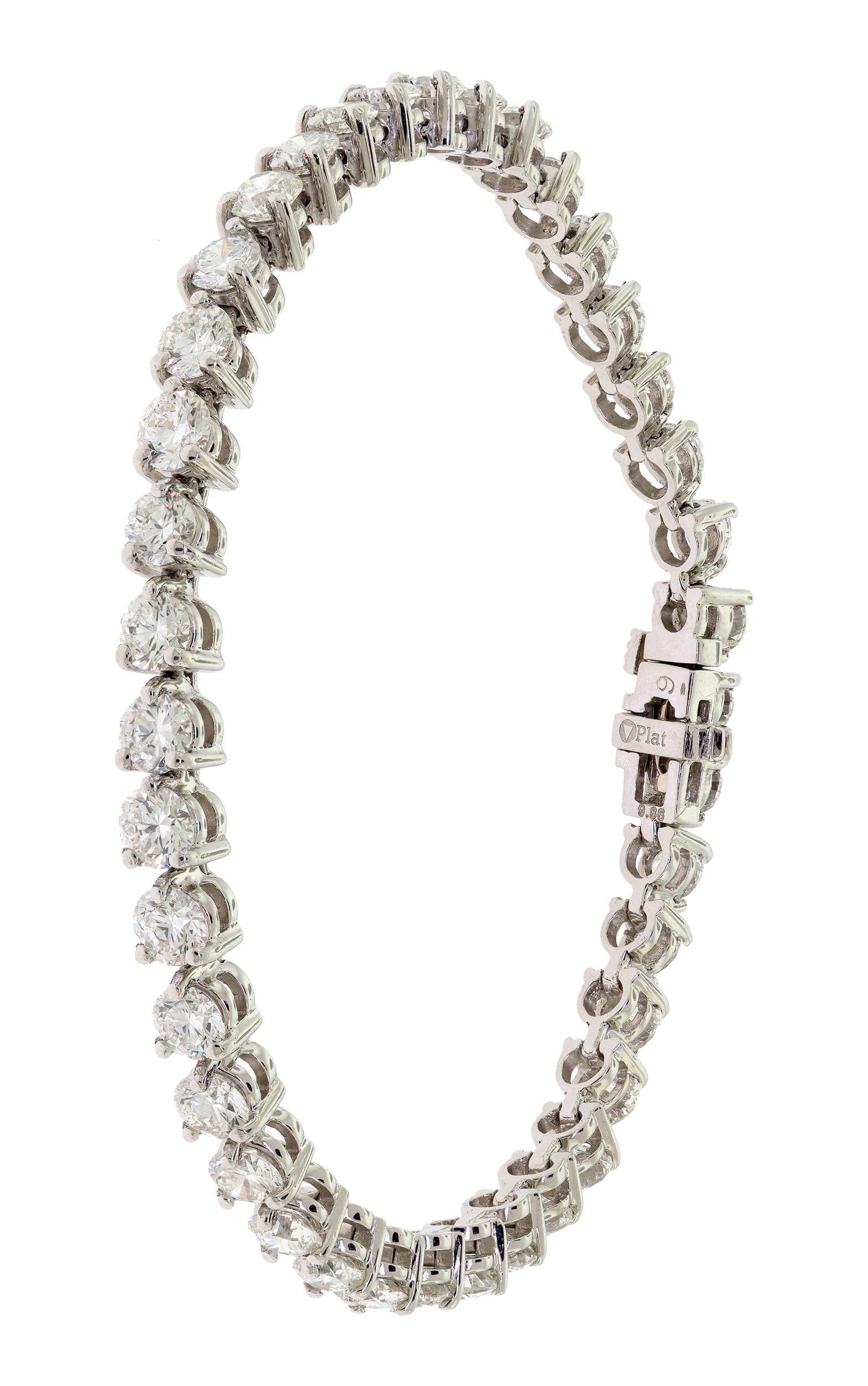 PLATINUM 9.86 CT. TW. RBC DIAMOND TENNIS BRACELET.: A platinum (stamped) tennis bracelet set with stated to be 9.86 ct. tw., round brilliant cut, natural diamonds of H-I color and VS-SI clarity, approx. .28 ct. each or 4mm, 7 5/16 inches long, 25.7 gra