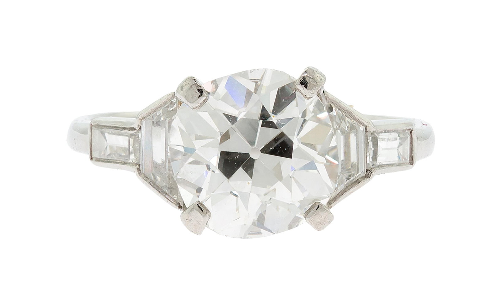 ART DECO PLATINUM OLD MINE DIAMOND ENGAGEMENT RING.: An Art Deco, platinum (stamped, faded), engagement ring set with a GIA certified, 2.43 ct., Old Mine brilliant cut, natural diamond of H color and SI2 clarity with approx. .80 ct. tw., trapezoid and b