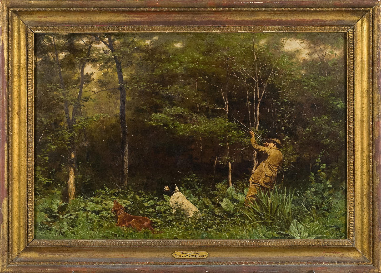 JOHN MARTIN TRACY OIL, TAKING WING.: John Martin Tracy (1843-1893) oil on canvas, titled on frame plaque, Taking Wing. Depicting a bird hunter with two dogs flushing game birds in forest. Signed lower right J.M. Tracy. Labeled on back Mo