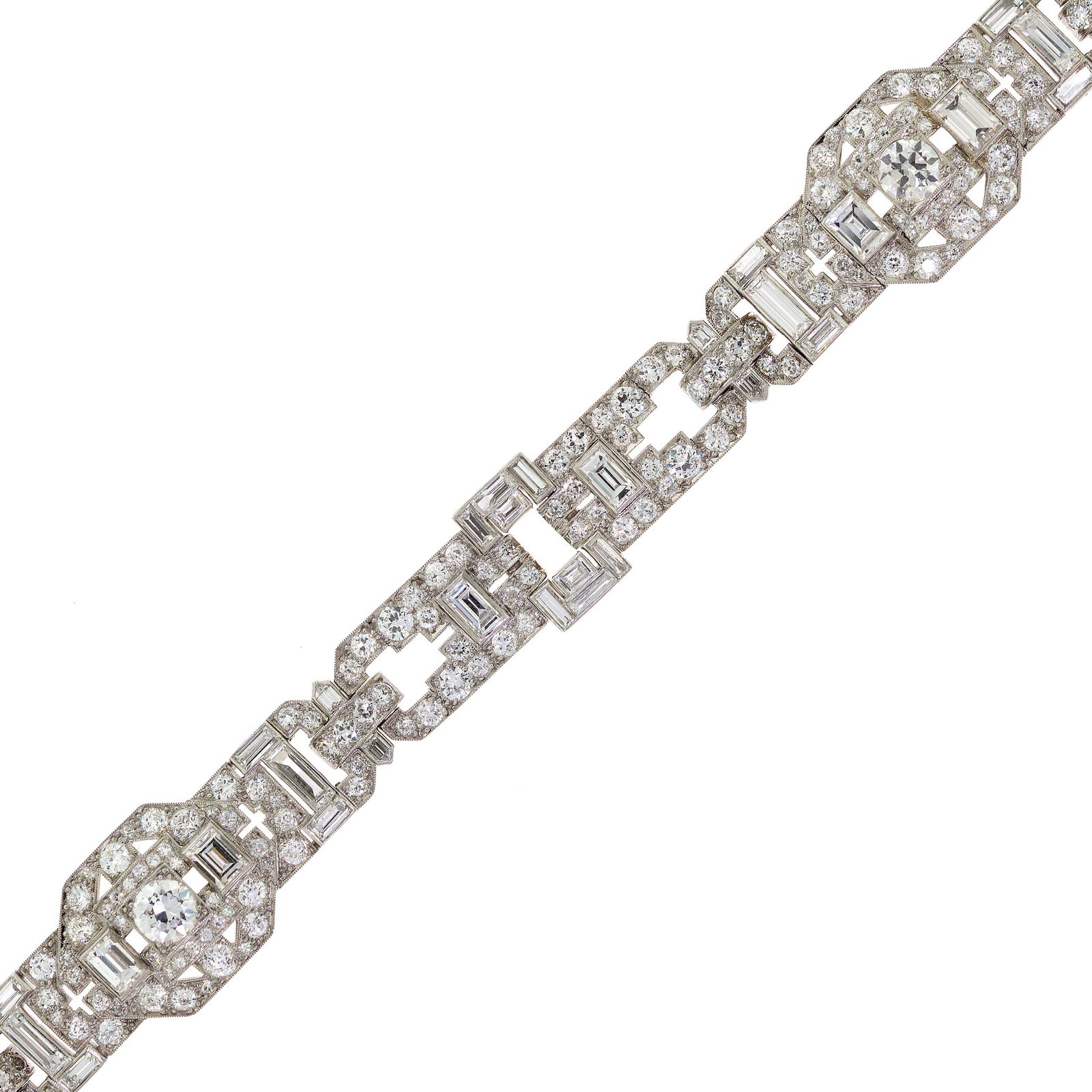 ART DECO PLATINUM DIAMOND BRACELET.: An Art Deco, platinum (tested), bracelet set with approx. 18 ct. tw., Old European, baguette and single cut, natural diamonds of G-H color and VS clarity, (larger round diamonds measure approx. 5.5 x 