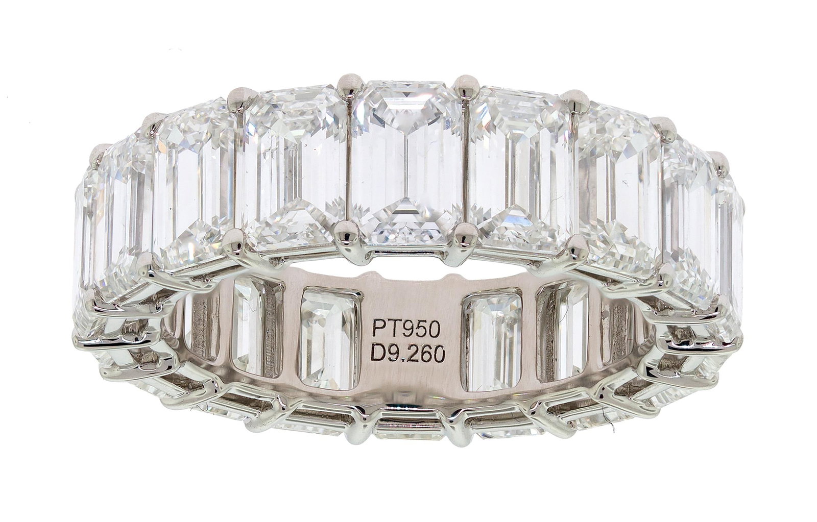 PLATINUM 9.26 CT. TW. EC DIAMOND ETERNITY BAND.: A platinum (stamped), eternity band set with exactly, 9.26 ct. tw., emerald cut, natural diamonds of H-I color and VS1-VS2 clarity. Ring size 6 3/4, 6mm wide, 6.9 grams. Tested as natural mined diamon