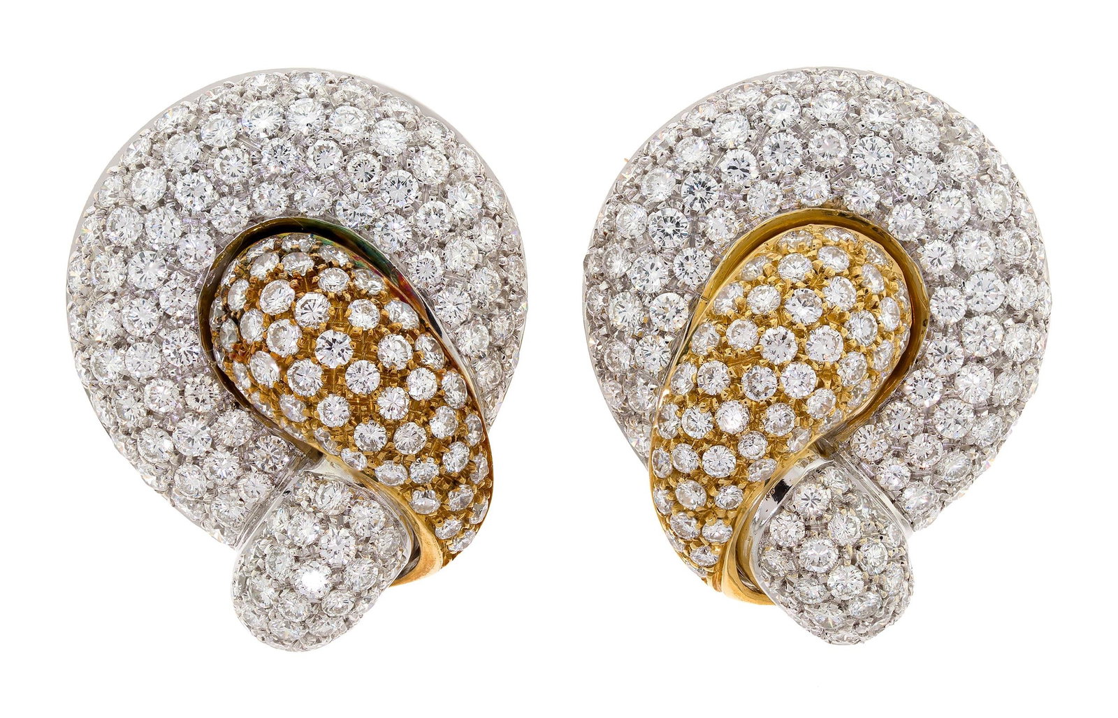 ITALIAN 18K TWO-TONE GOLD PAVE DIAMOND CLIP EARRINGS.: A pair of Italian, 18k yellow and white gold (stamped), clip earrings set with approx. 6.0 ct. tw., round brilliant cut, natural diamonds of F-G color and VS clarity, 1 1/4 inches long, 29.3 grams. Te