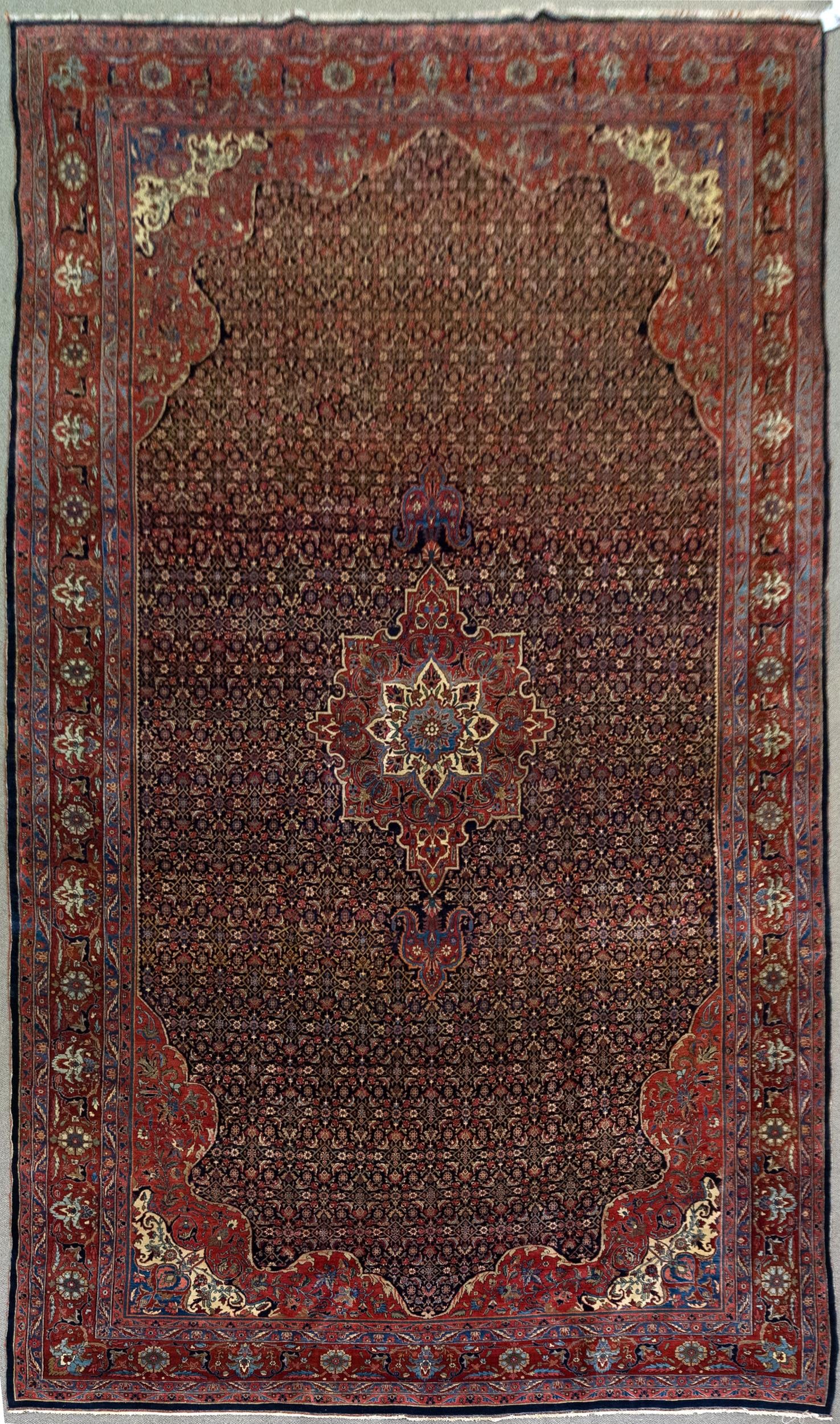 ANTIQUE PERSIAN BIDJAR ORIENTAL PALACE SIZE RUG.: A fine ca. 1920 hand woven Oriental palace size Persian Bidjar rug. Cobalt blue ground, highlighted with ivory, blue. 12’ x 20’4.