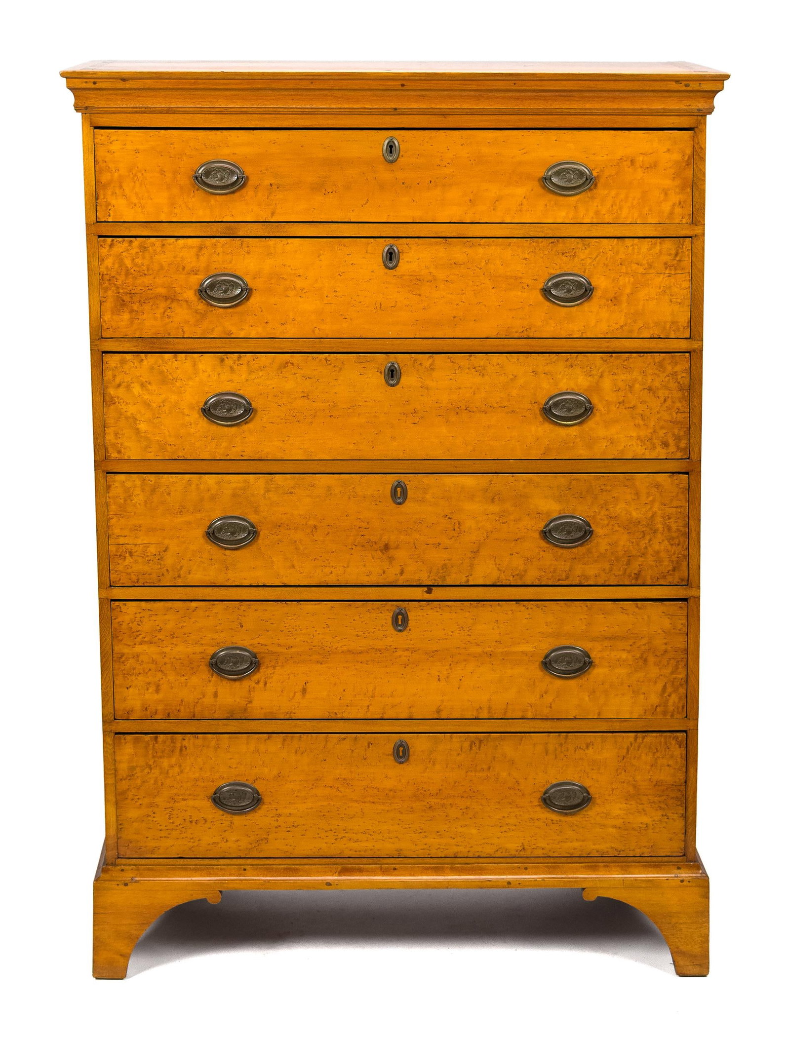 18TH C. NE BIRDSEYE MAPLE TALL CHEST.: A striking ca. 1790 New England solid birdseye maple tall chest with applied cornice molding and six graduated drawers with fantastic graining, and likely original embossed oval eagle motif brasses, o