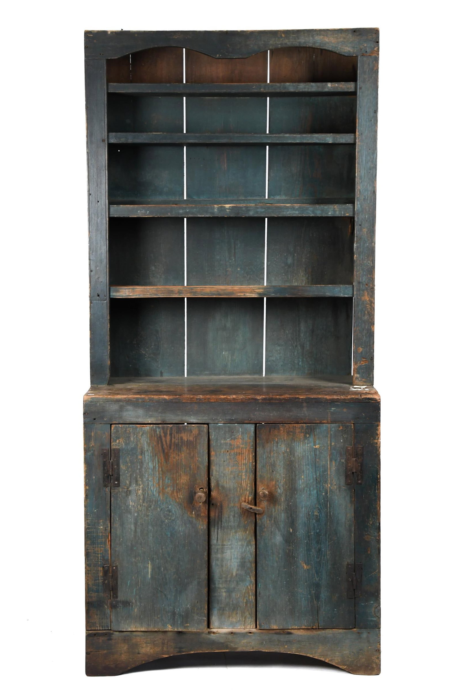 18TH C. BLUE PAINTED AMERICAN HARD-PINE DISH CUPBOARD: Ca. 1780 Southern states and likely Carolinas, single part cupboard having an open top over two doors, in an appealing worn teal-blue-green painted surface. 84”H x 38.75”W x 20”D.