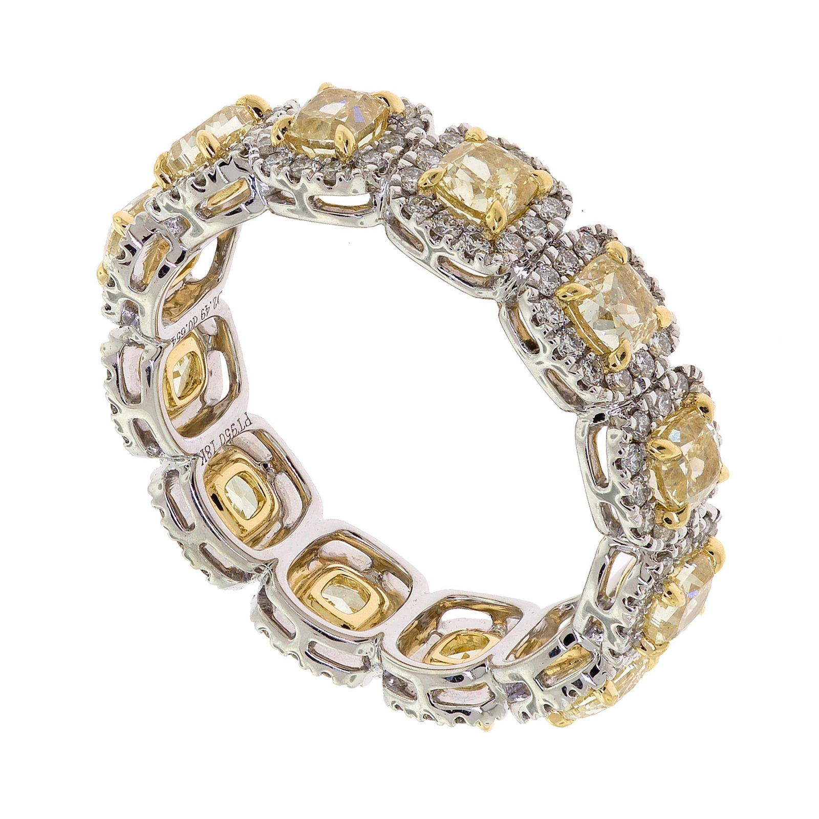 PLATINUM YELLOW & COLORLESS DIAM. HALO-STYLE BAND.: A platinum and 18k yellow gold (tested), halo-style eternity band set with 3.14 ct. tw., square radiant cut, natural diamonds of fancy yellow and round brilliant cut, natural diamonds of G-H color