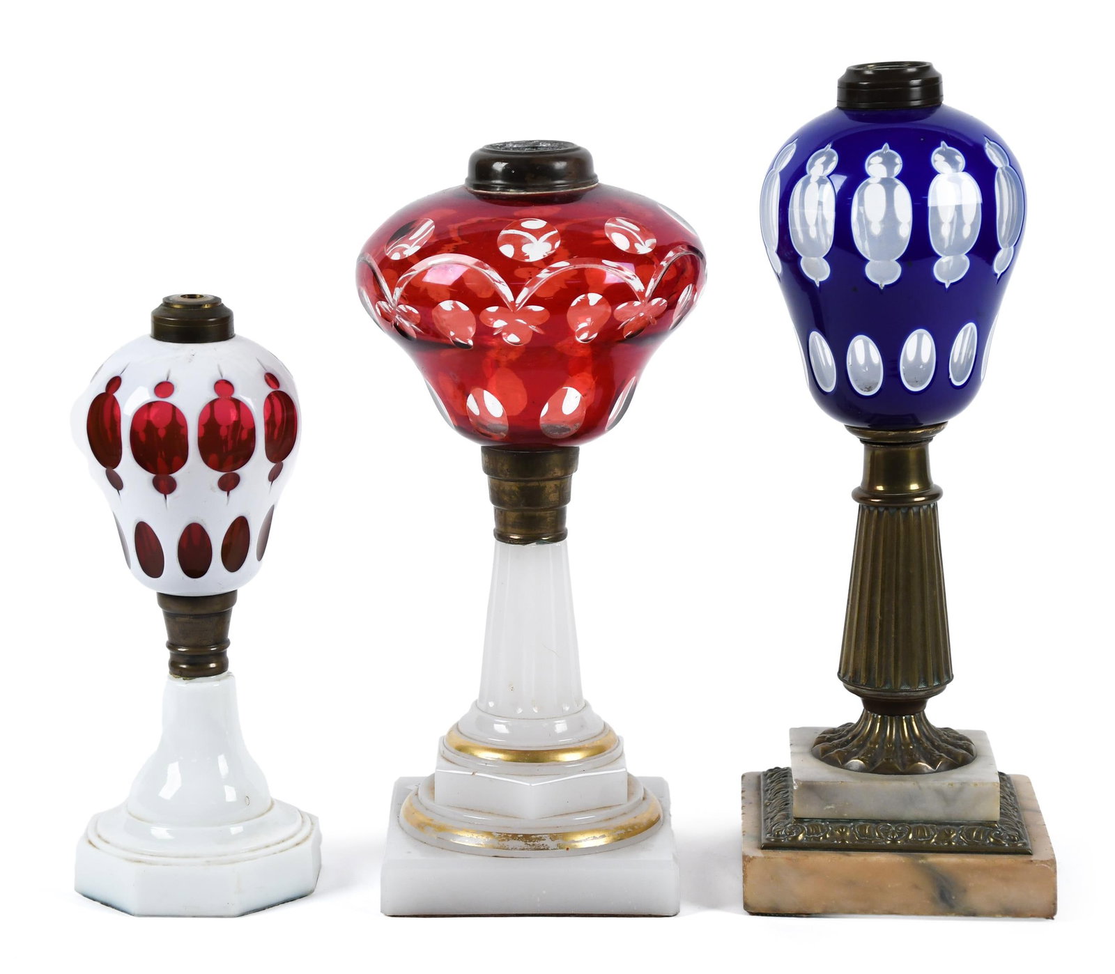 THREE ANTIQUE CUT OVERLAY OIL LAMPS. (1 of 8)