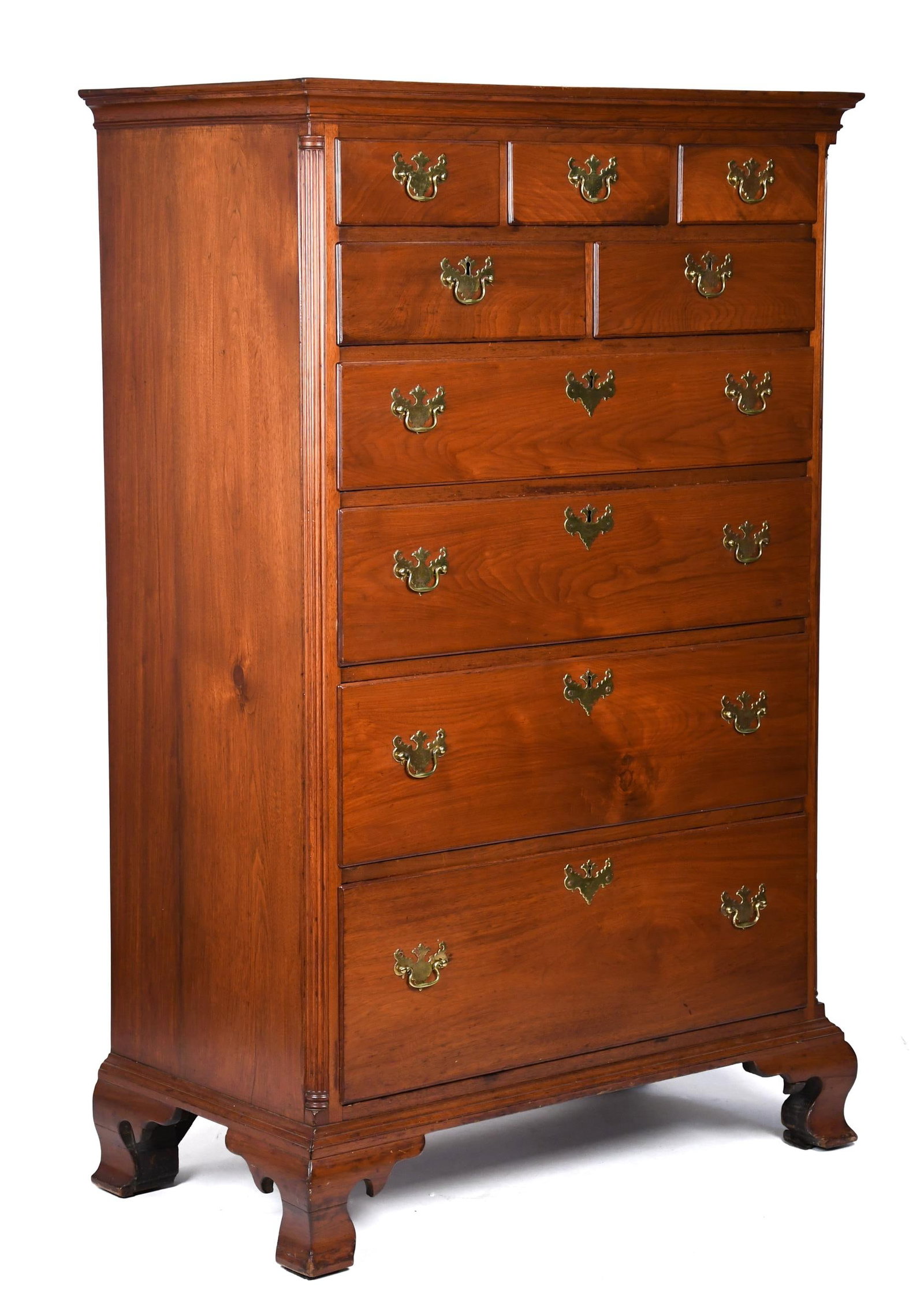 FINE PA CHIPPENDALE TALL CHEST.: A ca. 1785 Pennsylvania walnut tall chest with period brass, in a pleasing older finish. An applied molded top and three short over two short, over four long drawers, flanked by fluted corner columns,