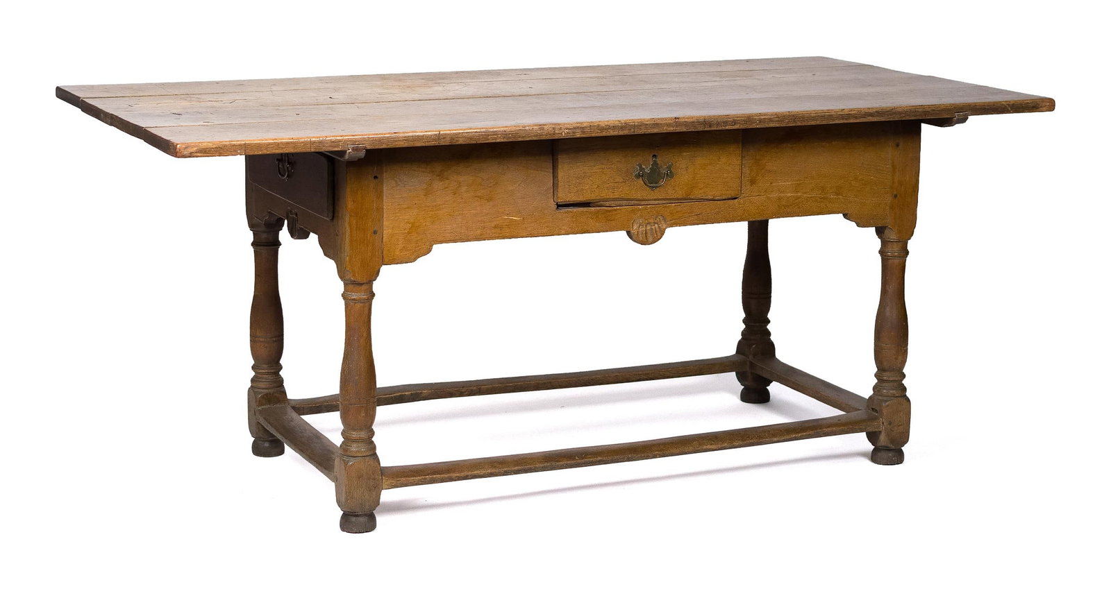 DOCUMENTED 18TH C. PA WALNUT TAVERN TABLE.: A ca. 1750 Pennsylvania walnut tavern table with a removable rectangular top on base with three drawers and four turned legs ending in compressed ball feet with box form stretcher. 29”H x 68.5&#