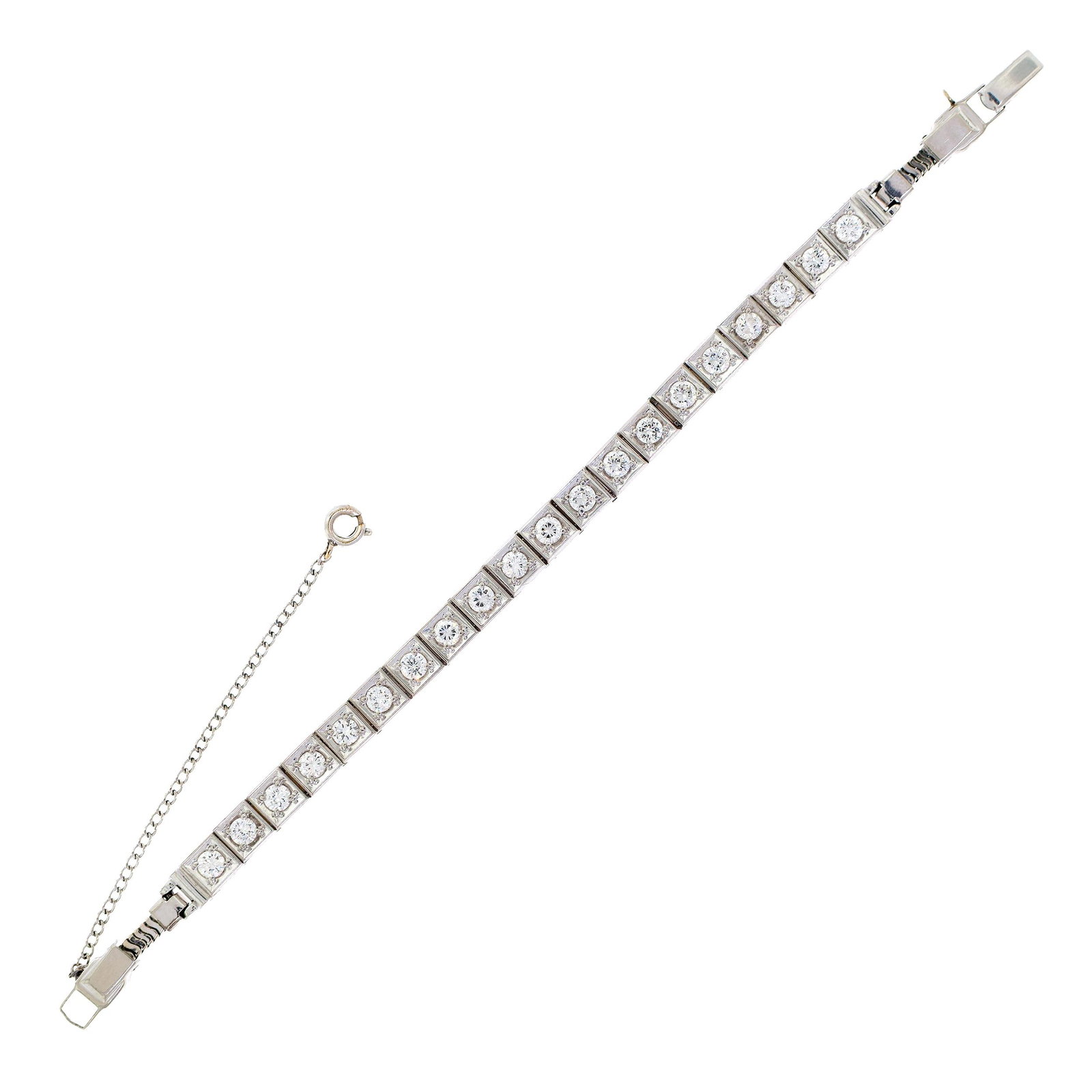 VINTAGE 18K GOLD ILLUSION SET DIAMOND BRACELET.: A vintage, 18k white gold (stamped) line bracelet, illusion set with approx. 2.6 ct. tw., round brilliant cut, natural diamonds of F-G color and VS clarity, 5mm wide, 6 1/4 inches long, 20.4 grams gro