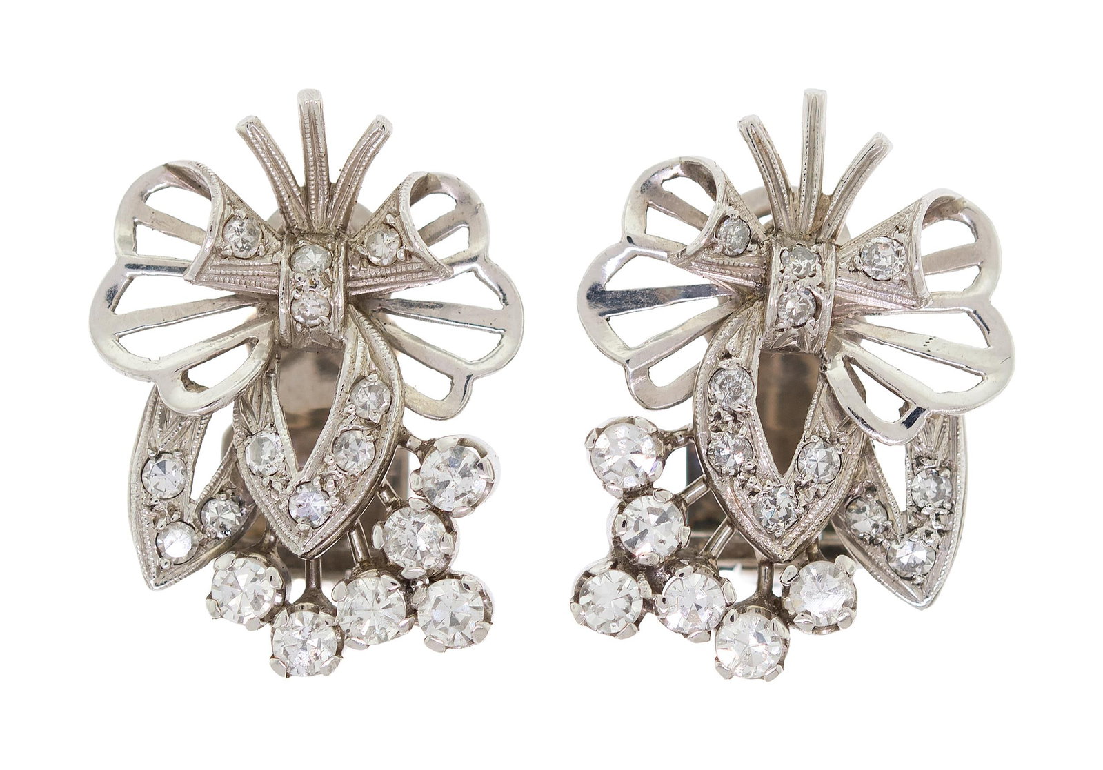 VINTAGE PLATINUM DIAMOND POST W/ CLIP EARRINGS.: A pair of vintage, platinum (tested) post earrings with clip closures set with approx. 1.12 ct. tw. single cut diamonds of G-H-I color and VS-SI clarity, approx. 1 inch long, 10.5 grams.