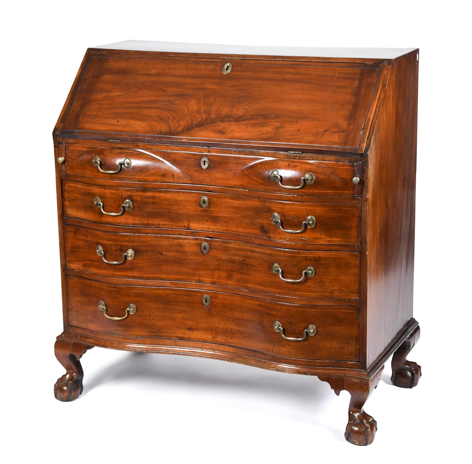 18TH C. AMERICAN SERPENTINE BLOCK FRONT DESK.: A ca. 1770 New England Chippendale serpentine block front mahogany desk with string inlay on drawer fronts, interior of desk compartment featuring a symmetrically arranged assortment of drawers, all w