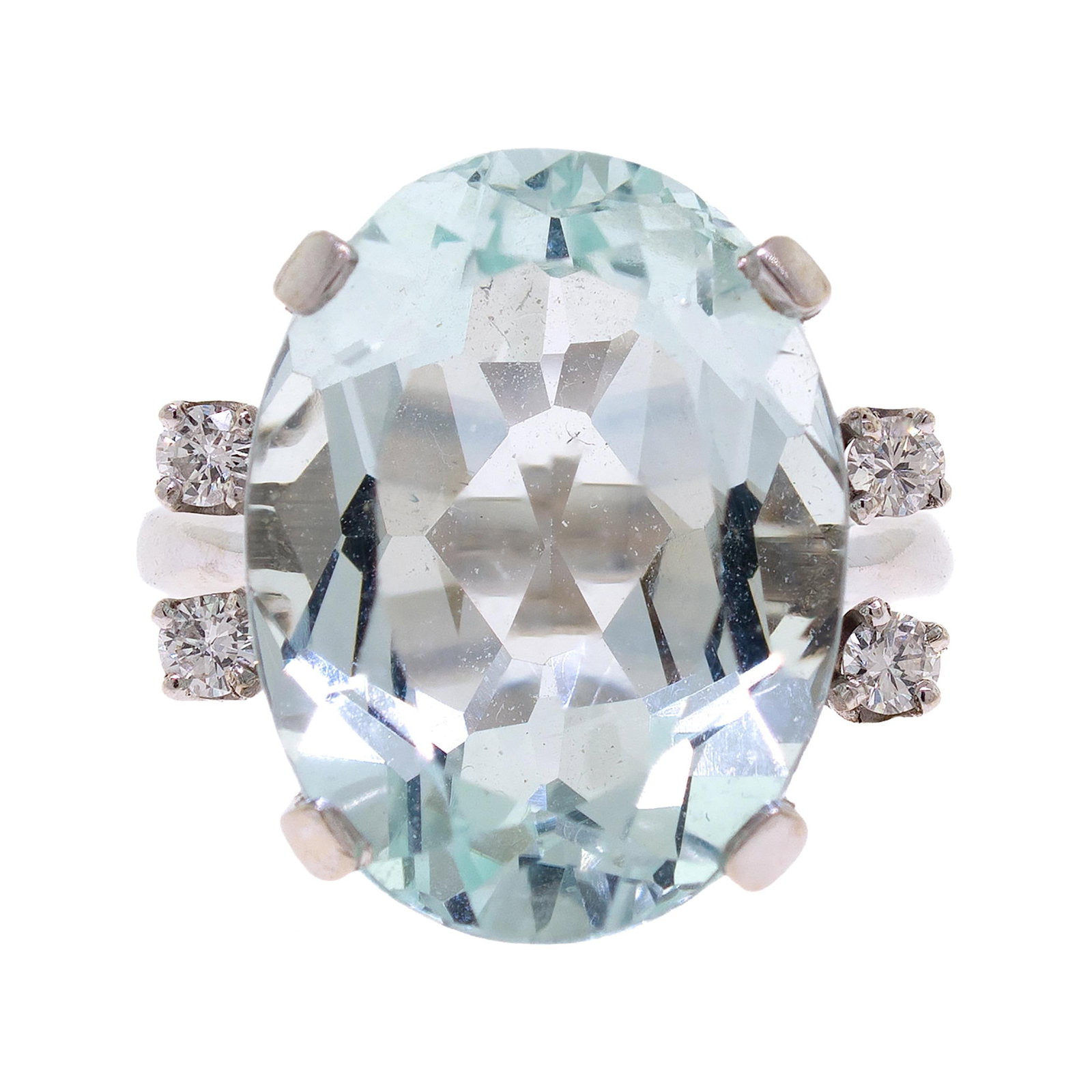 VINTAGE 14K GOLD 11 CT. AQUAMARINE & DIAMOND RING.: A vintage, 14k white gold (tested) ring set with an approx. 11 ct., faceted oval, light greenish blue aquamarine and approx. .20 ct. tw., round brilliant cut, natural diamonds of G-H color and VS-SI