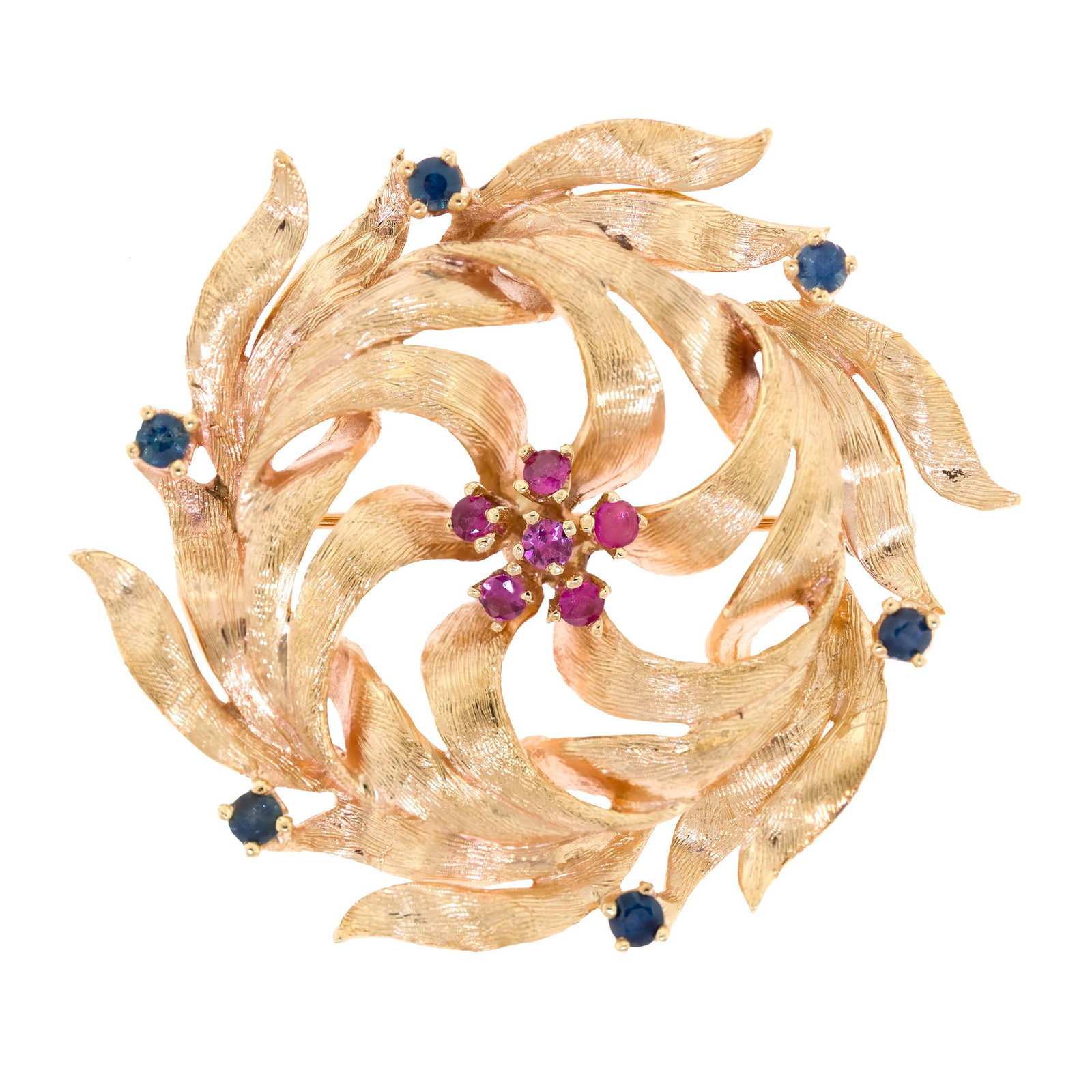 MID-CENTURY 14K GOLD RUBY & SAPPHIRE WREATH PIN.: A mid-century, 14k yellow gold (stamped), wreath pin set with approx. .55 ct. tw., faceted round, medium light red and medium blue sapphires, 1 3/4 inch dia., 13.7 grams.