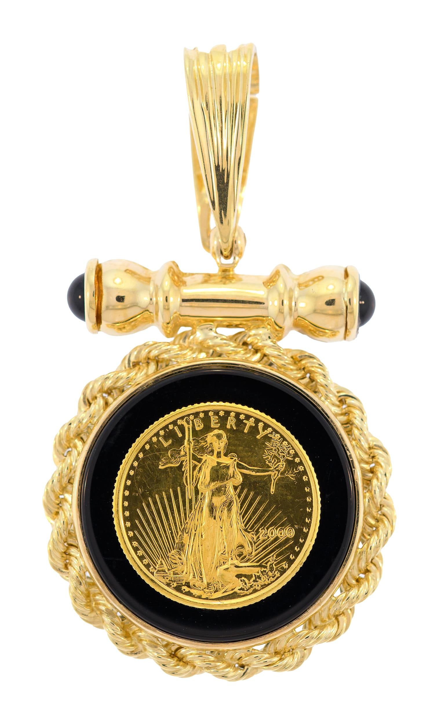 14K GOLD ST. GAUDEN'S COIN & BLACK ONYX PENDANT.: A 14k yellow gold (stamped), St. Gauden's coin pendant with black onyx and open and close, oversized bail, 18mm dia., 2 inches long, 12.7 grams.