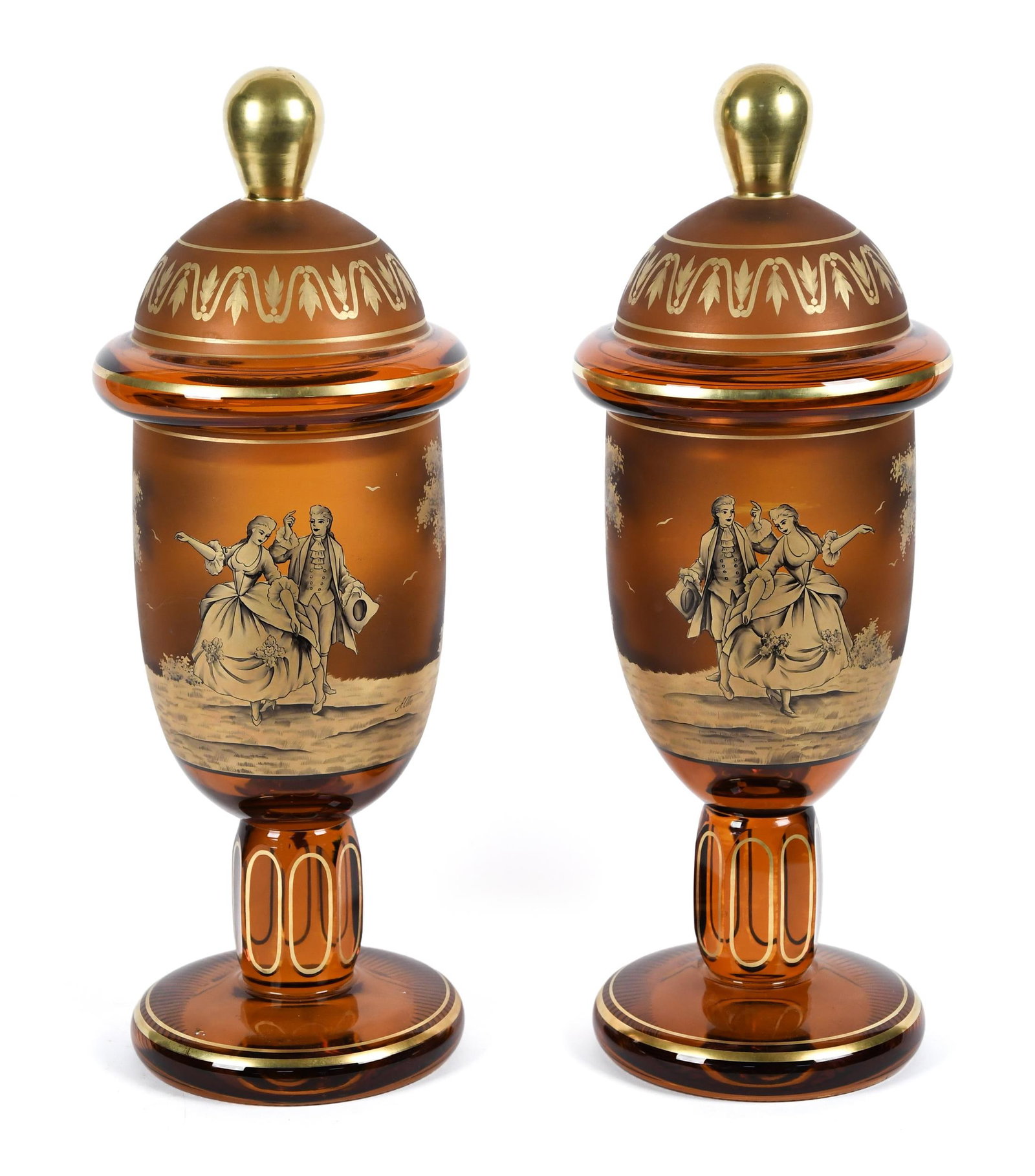 FINE PR. ANTIQUE BOHEMIAN MOSER GLASS POKALS.: A fine pair of antique Bohemian cut to clear amber colored Moser glass covered pokals featuring hand painted gold scene of a couple walking in a field. Each signed 'A. Otto’. 18.25”H x 6.2
