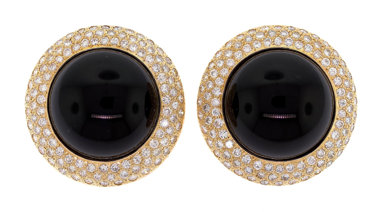18K GOLD BLACK ONYX & PAVE DIAMOND CLIP EARRINGS.: A pair of 18k yellow gold (stamped), black onyx, clip earrings set with approx. 3.5 ct. tw., round brilliant cut, natural diamonds of F-G color and VS-SI clarity, approx. 1 1/8 inch dia., 28.8 grams. 