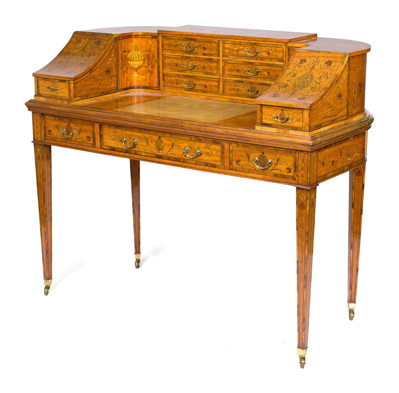 ENGLISH EDWARDIAN SATINWOOD CARLTON HOUSE DESK.: A ca. 1900 English Edwardian Carleton desk, in figured satinwood, with inlay and added black painted decoration, in motifs including Classical urn, foliage, basket of flowers and other. With many draw