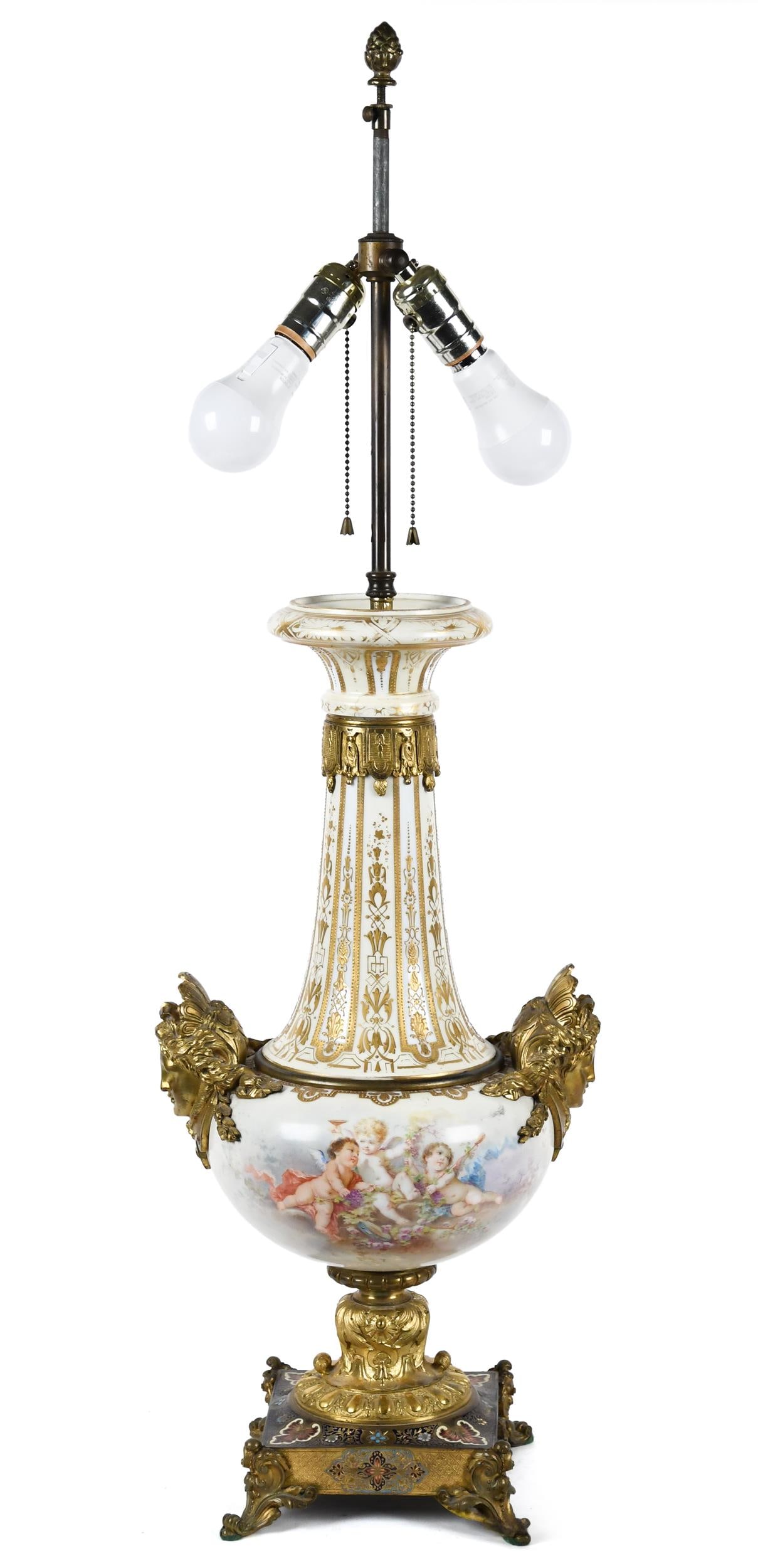 ANTIQUE FRENCH SEVRES STYLE HAND PAINTED LAMP.: A wonderful 19th C. hand painted French Sevres style porcelain vase with exceptional dore bronze mounts and champleve enameled base. Later converted to be a table lamp. 36”H overall.