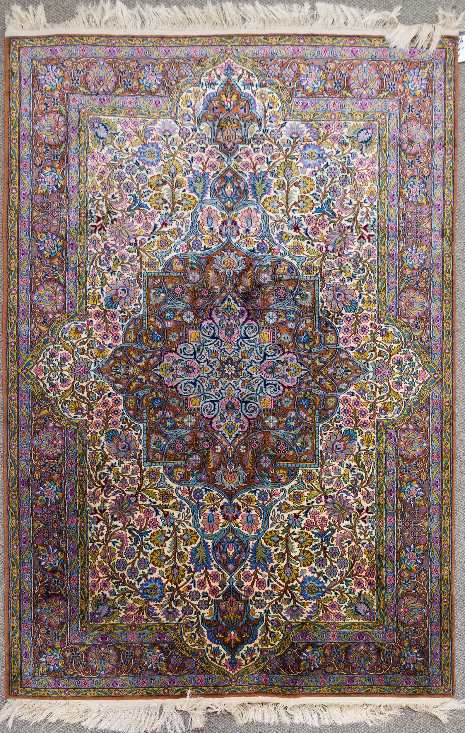 VINTAGE ORIENTAL SILK SCATTER RUG.: A good 20th C. hand woven Oriental silk scatter rug with fine weaving, ivory, blue and greens. 3’11” x 6’2”.