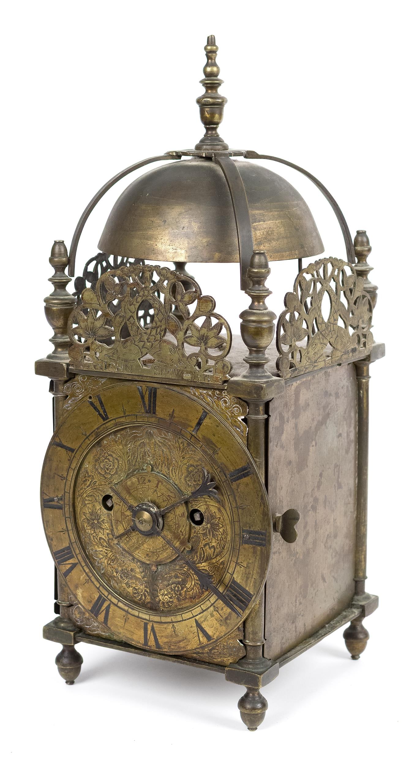 17TH C. JOHN SNOW BRASS LANTERN CLOCK.: A 17th C. brass striking lantern clock, front with engraved and pierced fretwork, the sides with matching pierced frets and opening doors, a 6.25” brass dial with Roman chapter ring. Signed John