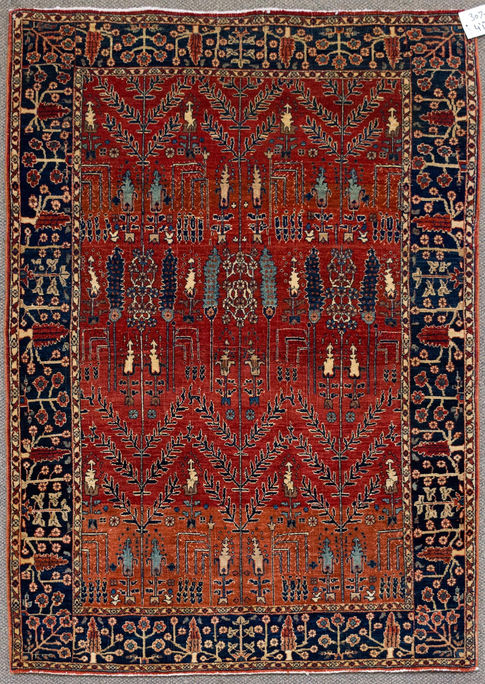 VINTAGE ORIENTAL PERSIAN BIDJAR AREA RUG.: A vintage hand woven Oriental Bidjar area rug with brick red ground, highlighted with ivory and blue. 4'1” x 5'9”.