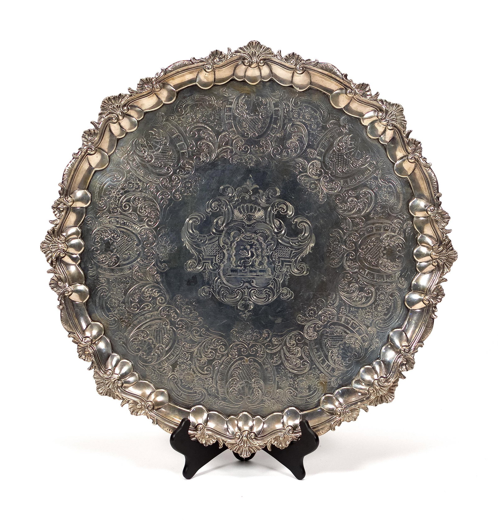 EXCEPTIONAL 19TH C. ENGLISH STERLING SALVER, 161 OZT.: An exceptional 19th C. English sterling silver salver, with elaborate chased designs, with central coat of arms and motto “Au Bon Droit” (associated with the Dalling and Egremont families)
