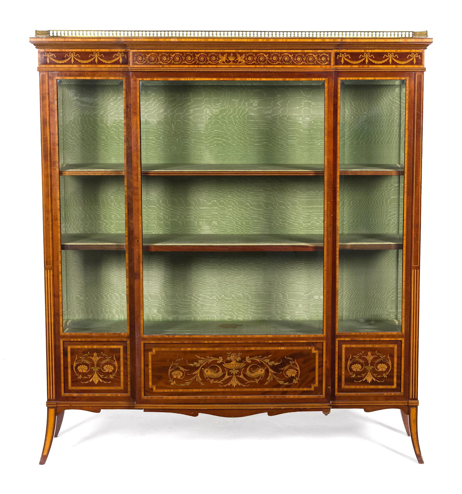 FINE EDWARDIAN INLAID MAHOGANY CHINA CABINET.: A ca. 1900 Edwardian inlaid mahogany china cabinet with a brass gallery op top over case with single glass door, flanked by glass sides, on delicate shaped legs. 58”H x 52.5”W x 15”D