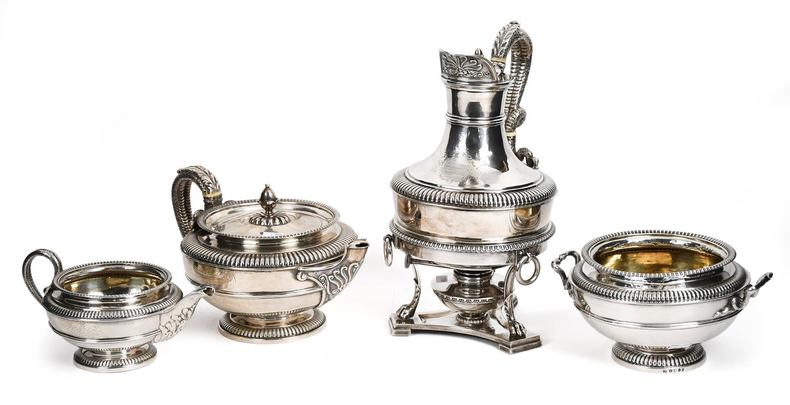 FINE PAUL STORR ENGLISH STERLING TEA SET.: A ca. 1810 Paul Storr English sterling silver tea set, snake motif, four pieces including kettle on stand with burner, 11.5”H, teapot 10”W, sugar or waste bowl 8” dia. Creamer 7.5