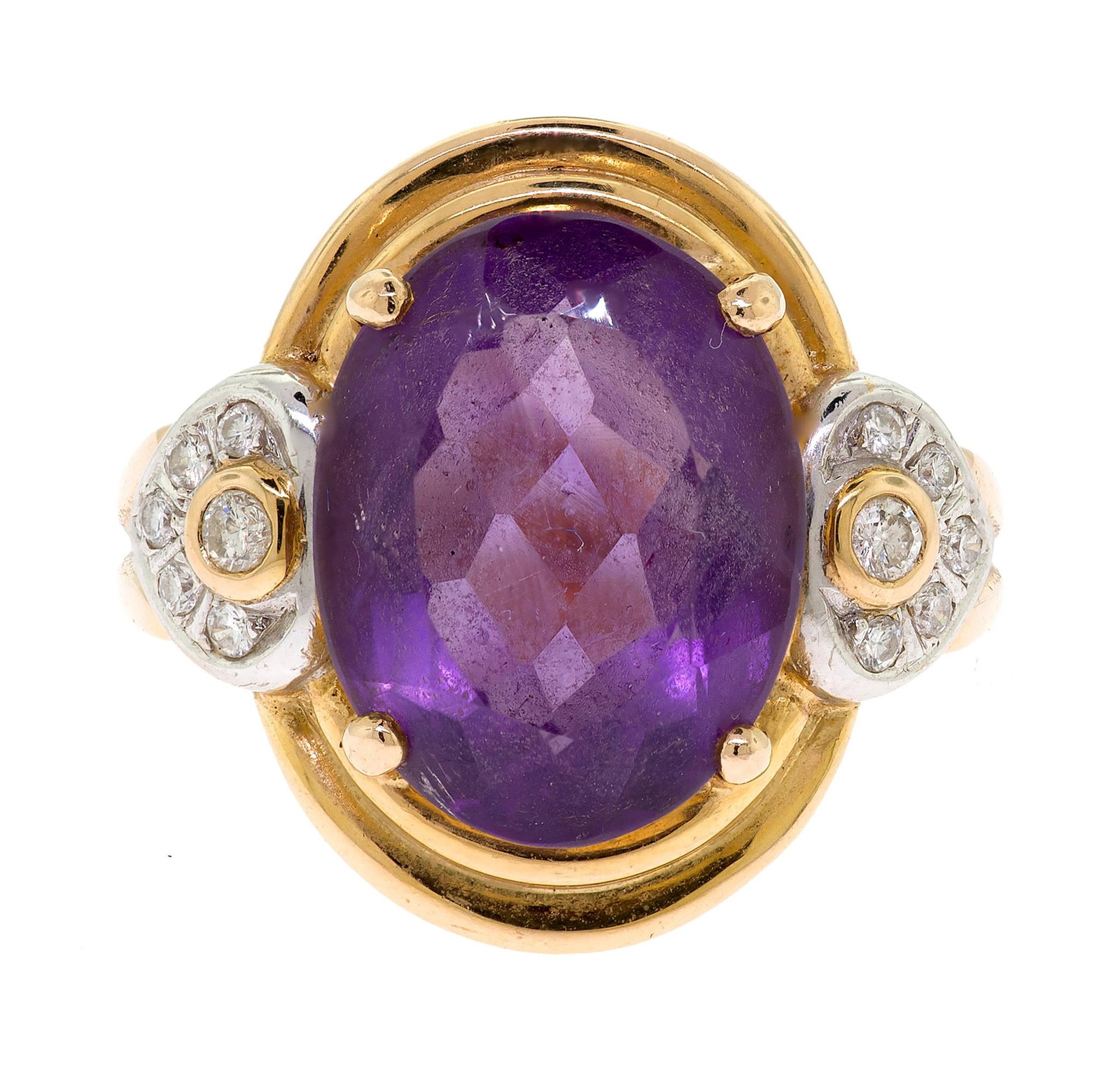 14K GOLD AMETHYST & DIAMOND HEART RING.: A 14k yellow gold (stamped) ring set with an approx. 5 ct., faceted oval, medium purple amethyst and approx. .14 ct. tw., round brilliant cut, natural diamonds of G-H color and VS clarity. Ring size 6