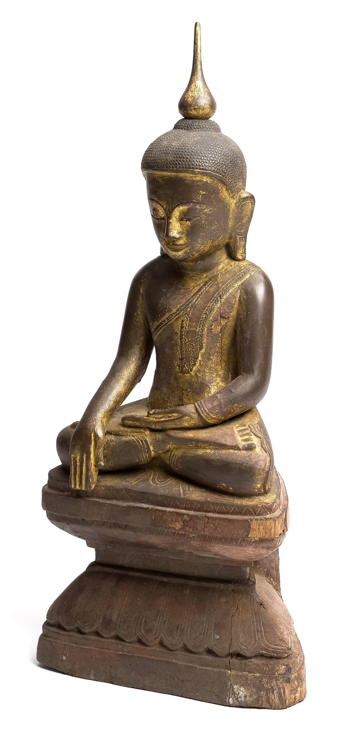 18TH C. ASIAN CARVED GILT-WOOD BUDDHA.: An early Burmese carved gilt wood Buddha figure in half lotus pose on integral carved base. 21.25”H x 9”W x 5”D.