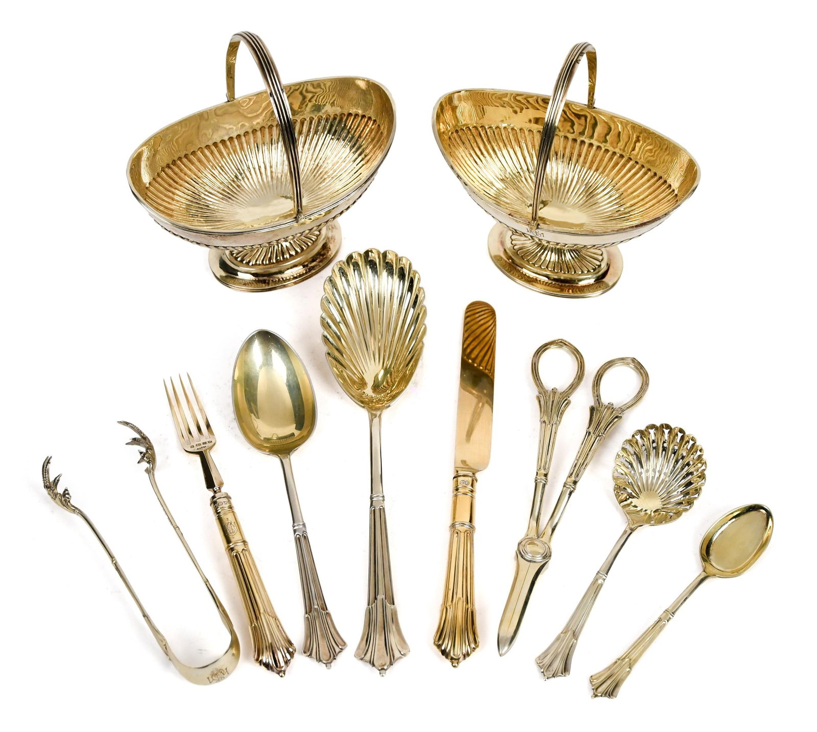 ANTIQUE ENGLISH STERLING CASED FLATWARE SET.: A late 19th C. Elkington & Co (Frederick Elkington) Sheffield, England, sterling silver flatware set, with vermeil decoration, in a custom burl veneered box with three lift out shelves. Total 128 troy