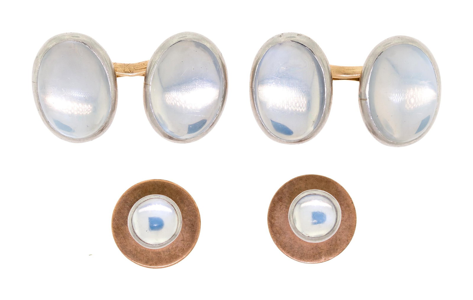 ANTIQUE 14K GOLD MOONSTONE CUFFLINKS & SHIRT STUDS.: Antique, 14k yellow gold and platinum (stamped and tested), cufflinks and shirt stud set (2 at 11mm) with approx. 15 ct. tw., moonstone cabochons with blue adularescence, 11.2 grams.