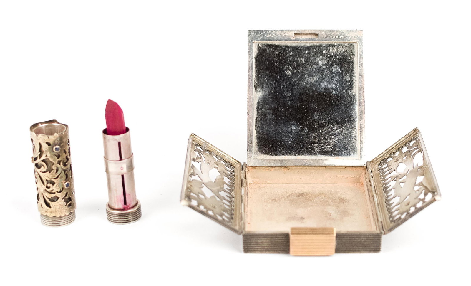 FRENCH LACLOCHE SILVER COMPACT & LIPSTICK CASE.: A French, signed, J. Lacloche, gold over sterling silver (tested), compact, 3” x 2 1/2”, and lipstick case, 2 1/16” long, set with approx. .50 ct. tw., faceted round, medium blue sap