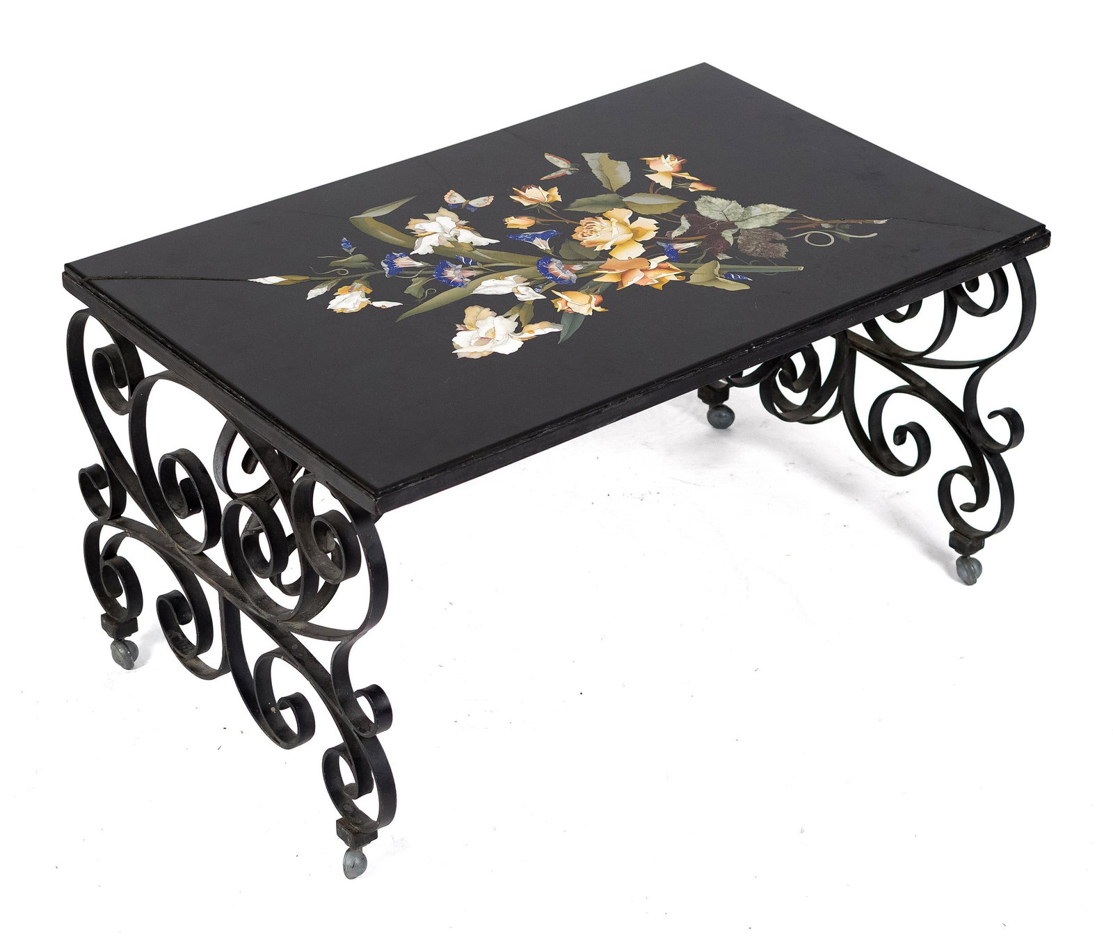 VINTAGE PIETRA DURA INLAID STONE COFFEE TABLE.: A ca. 1930 pietra dura floral inlaid black stone coffee table, supported by wrought iron base, on casters. 19”H x 37”W x 23”D.