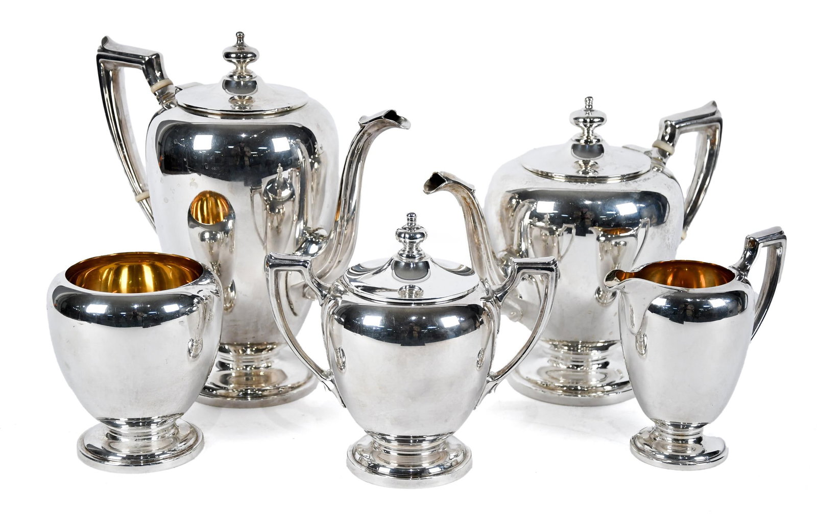 REED & BARTON FIVE PIECE STERLING TEA SET.: A vintage 20th C. Reed & Barton sterling five piece tea set, including a coffee pot 10”H, tea pot 8”H, creamer, sugar and waste bowl, 5”-6”H. 87.5 oz t.
