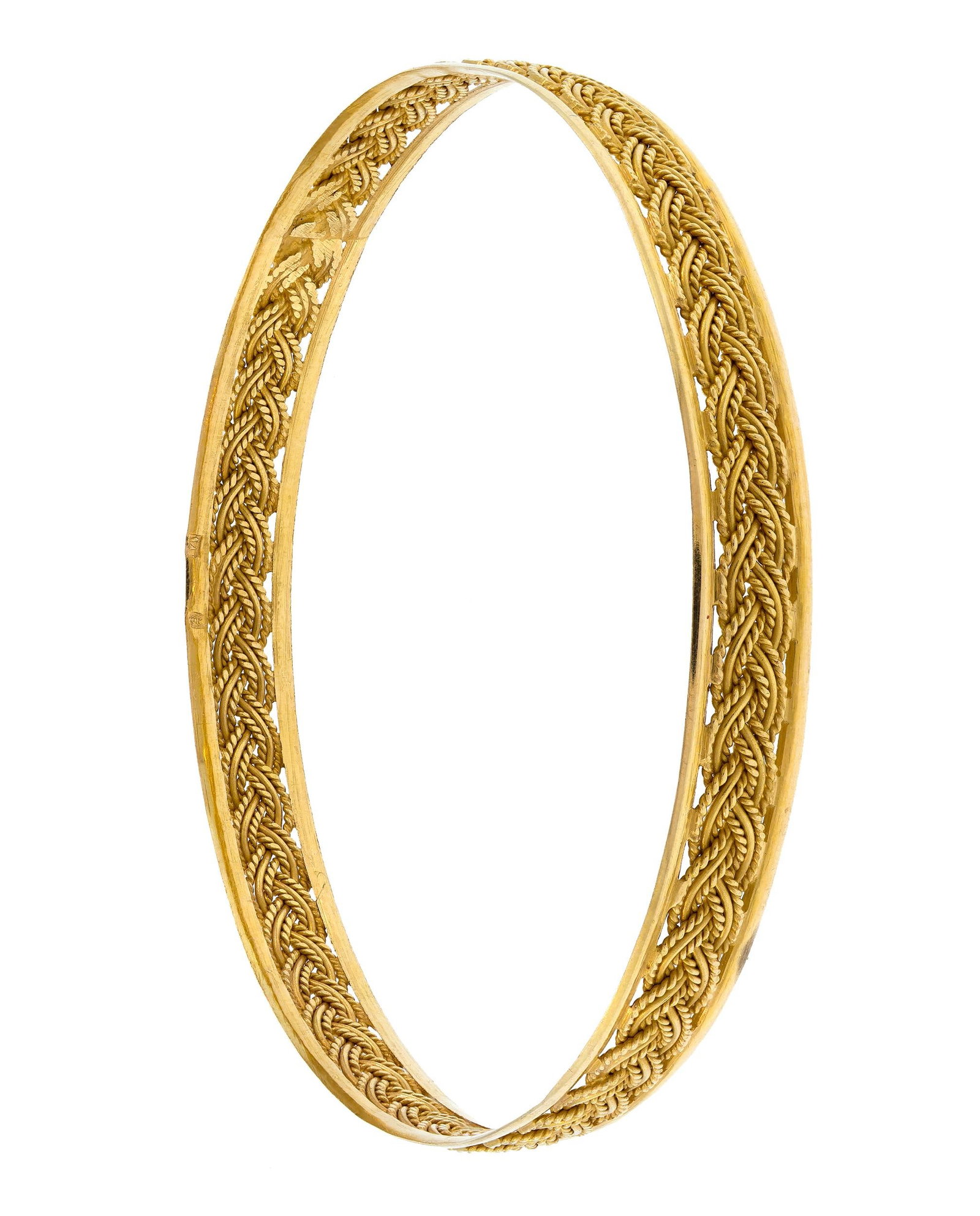 18K YELLOW GOLD BRAIDED BANGLE BRACELET.: An 18k yellow gold (tested) braided bangle bracelet, 7.5mm wide, approx. 8 inch wrist, 11.8 grams.