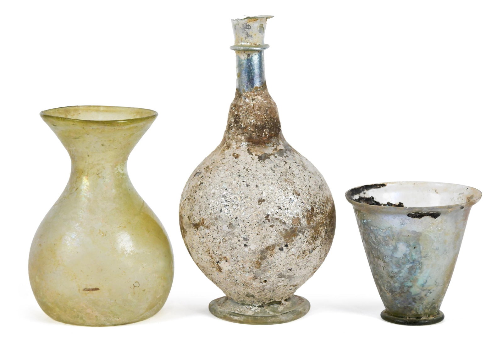 ROMAN GLASS, 3 PIECES.: Three small pieces of Roman glass, very thin and delicate vessels including an iridescent light blue slim necked bottle 8”H, a matching cup 3.25”H, and a light yellow baluster-form vase 5.