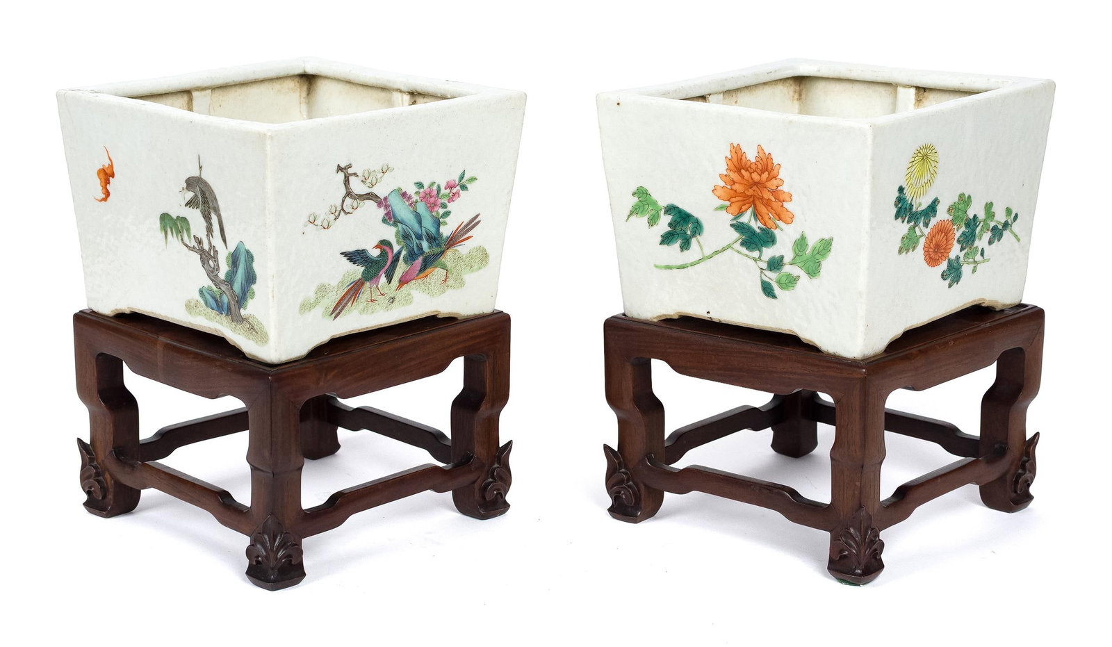 PR. ANTIQUE CHINESE PORCELAIN PLANTERS WITH STANDS.: A pair of antique Chinese porcelain tapering square form bulb planters/jardinieres with polychrome enamel Famille Rose decorations of birds and floral motifs. On separate carved rosewood stands. Porce